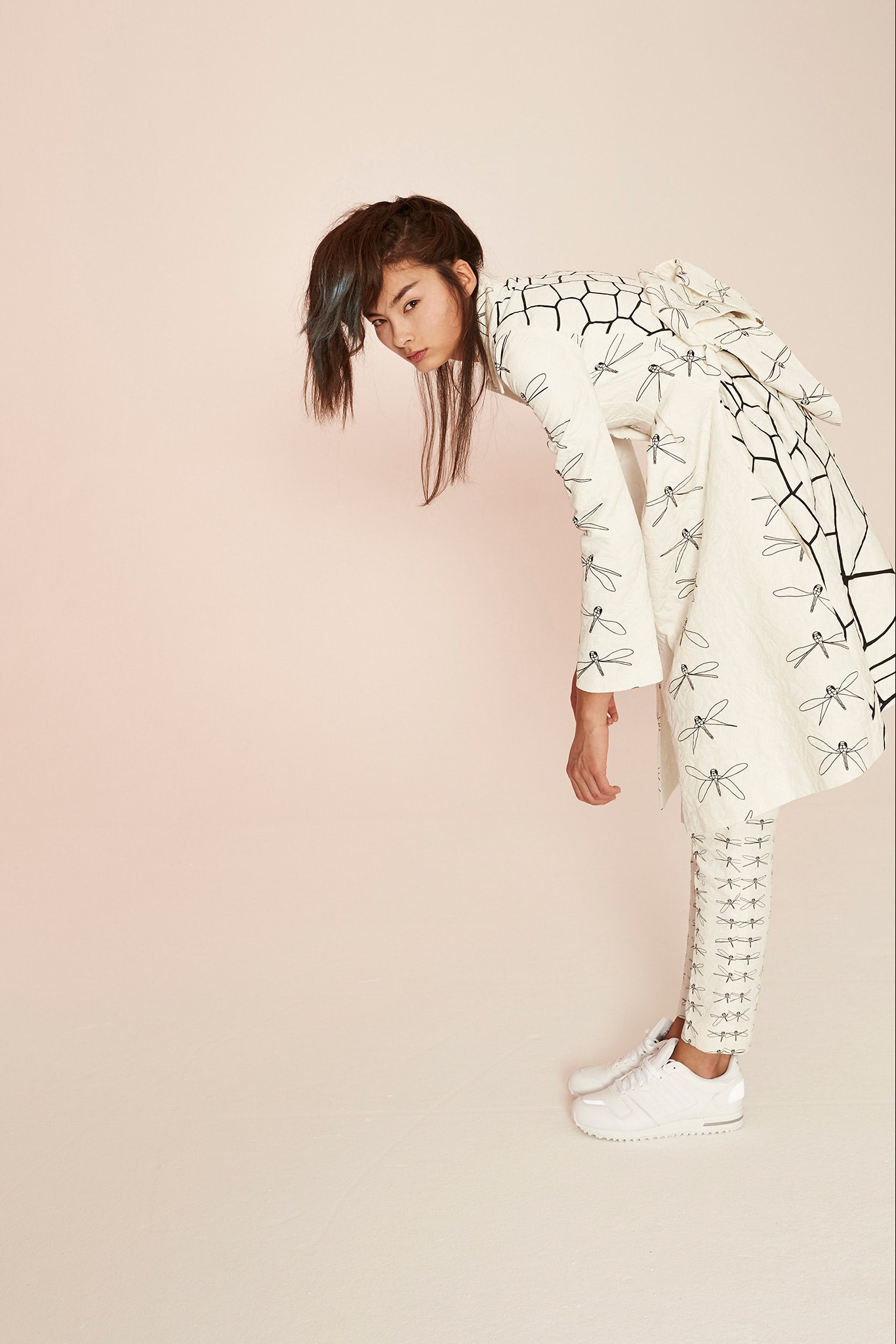 white embroidered coat and pants
