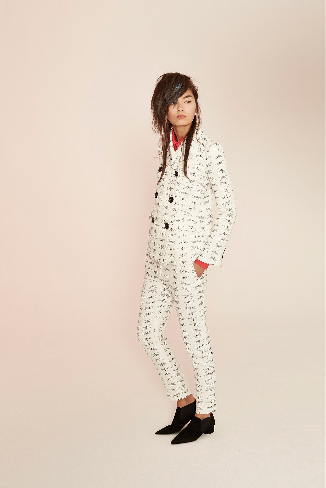 white printed tailored suit with red shirt