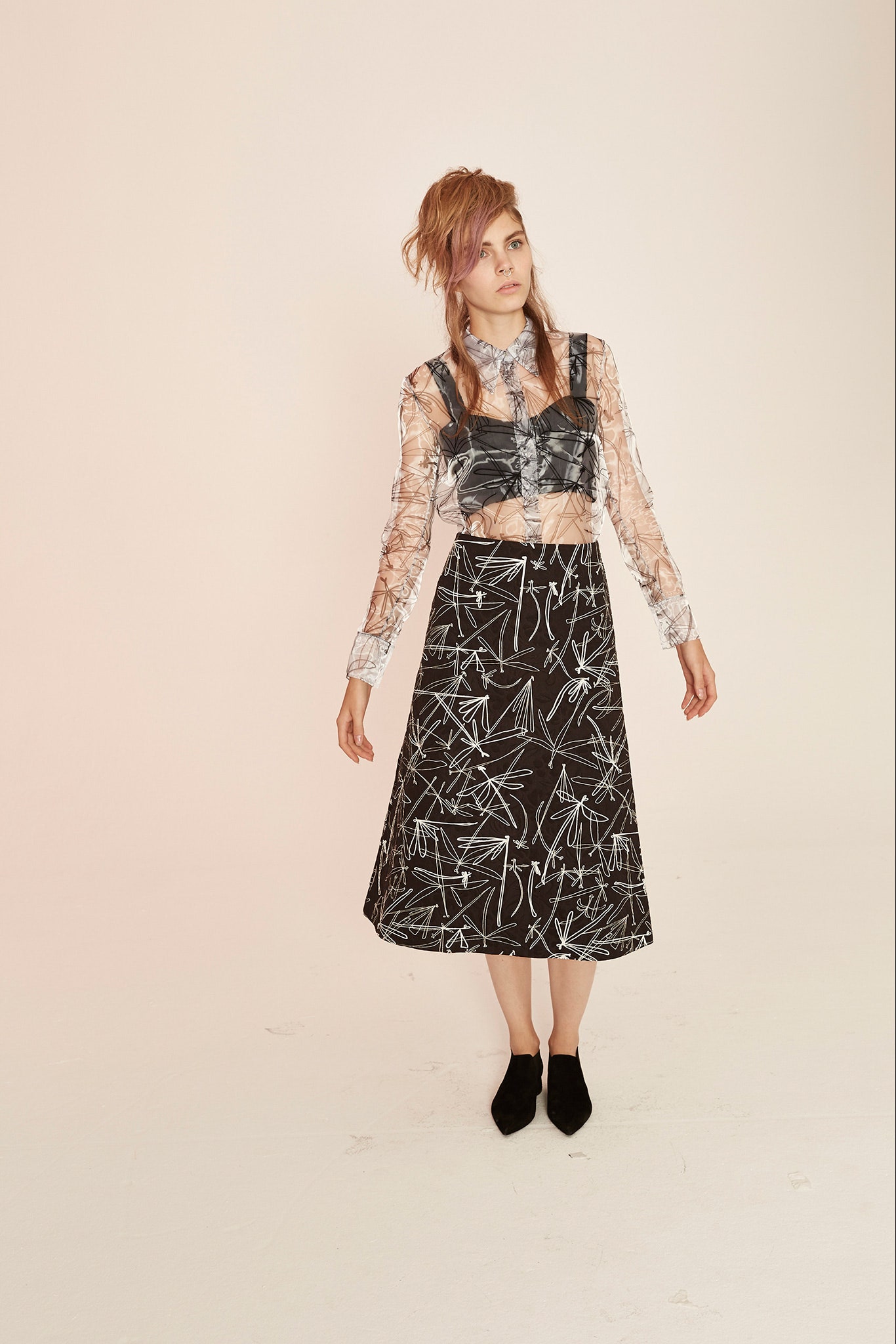 sheer blouse with printed midi skirt