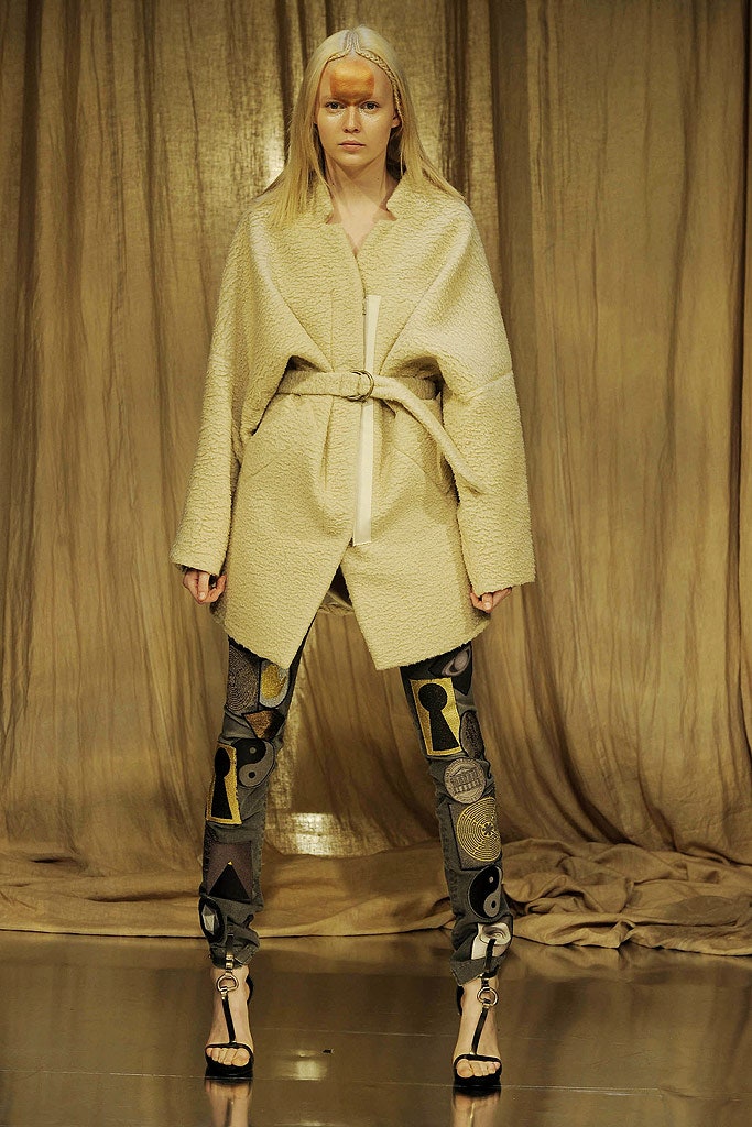 beige wool coat with printed pants