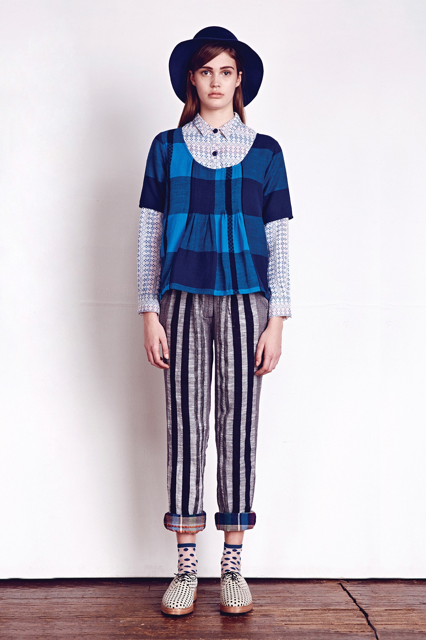 blue relaxed top with striped pants