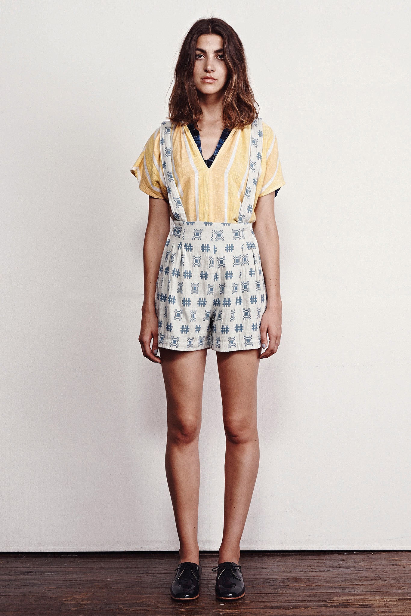 yellow striped top with blue printed shorts