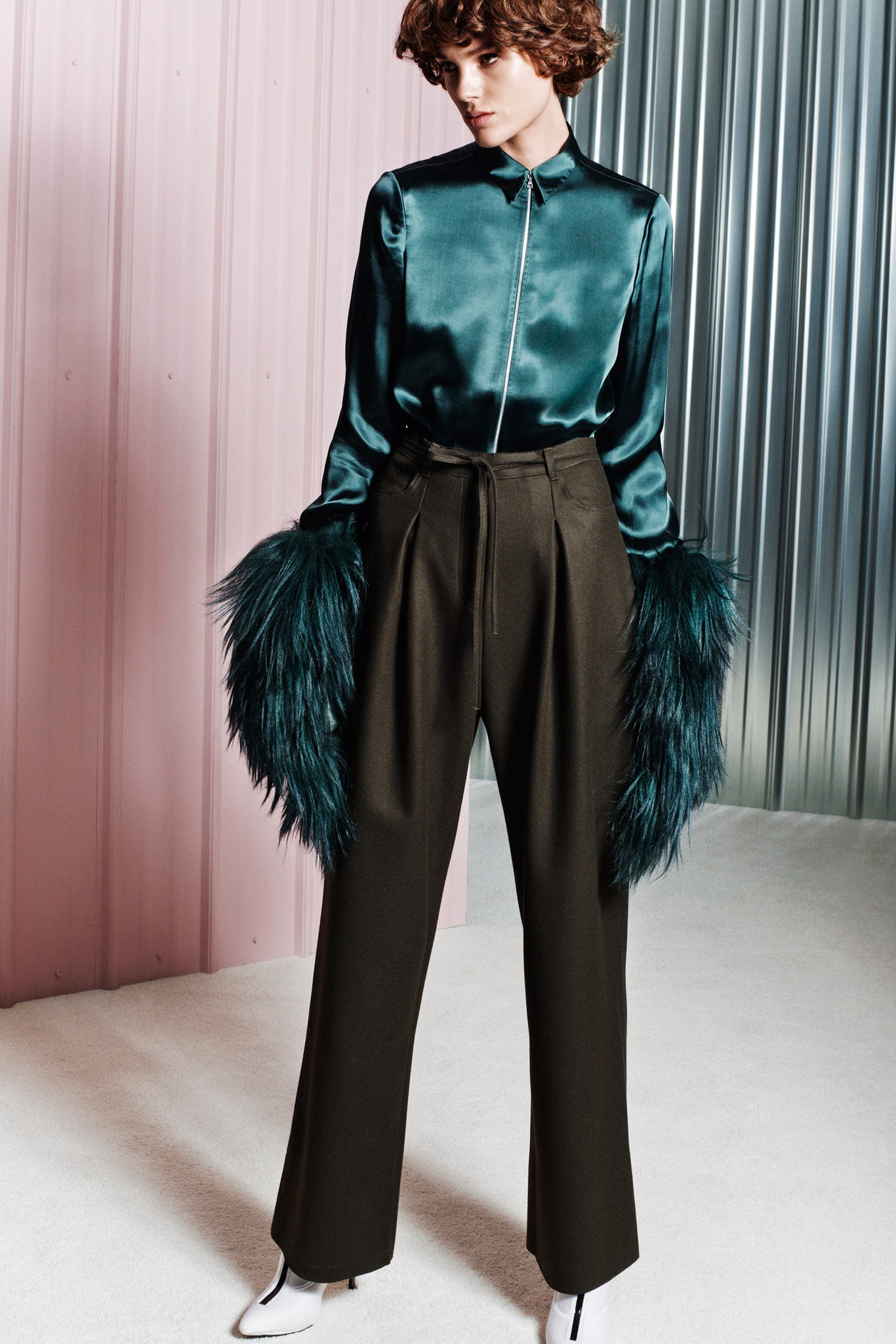 green silk shirt with wide-leg pants