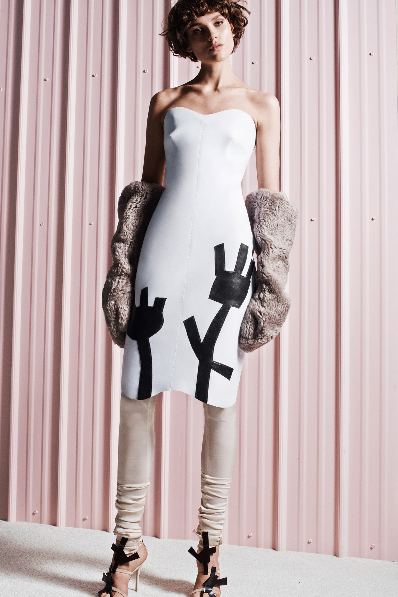 white strapless dress with faux-fur coat