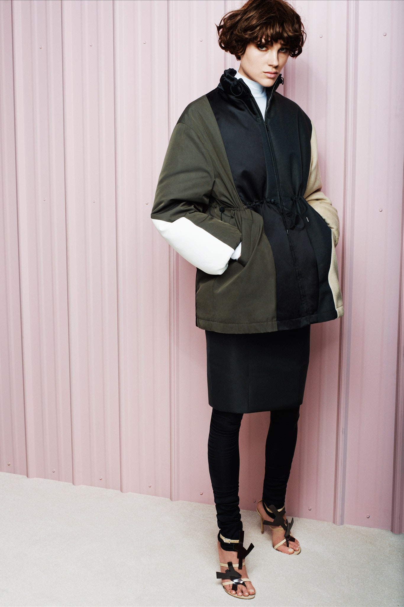 relaxed black green jacket with fitted skirt