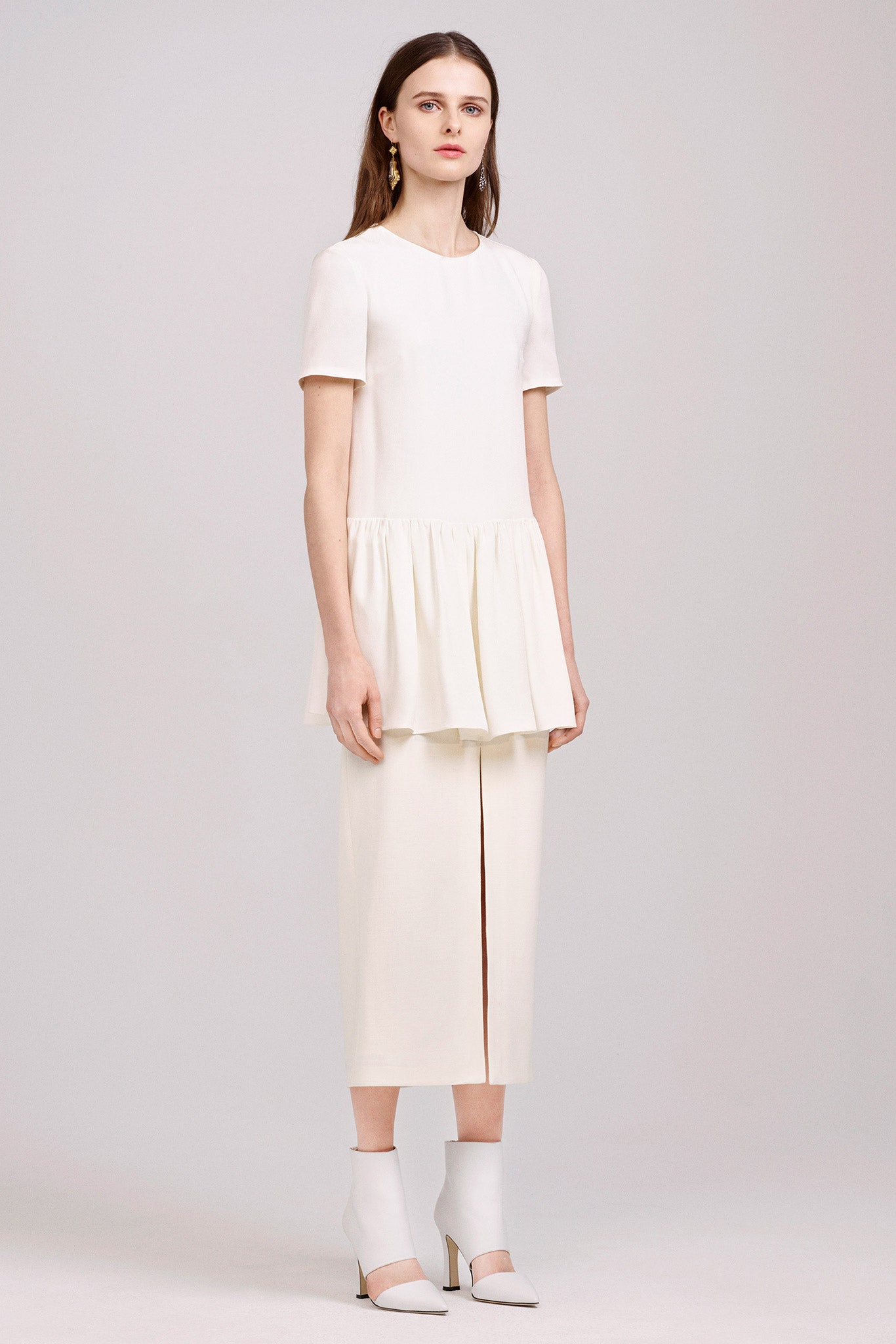 white silk peplum top and skirt