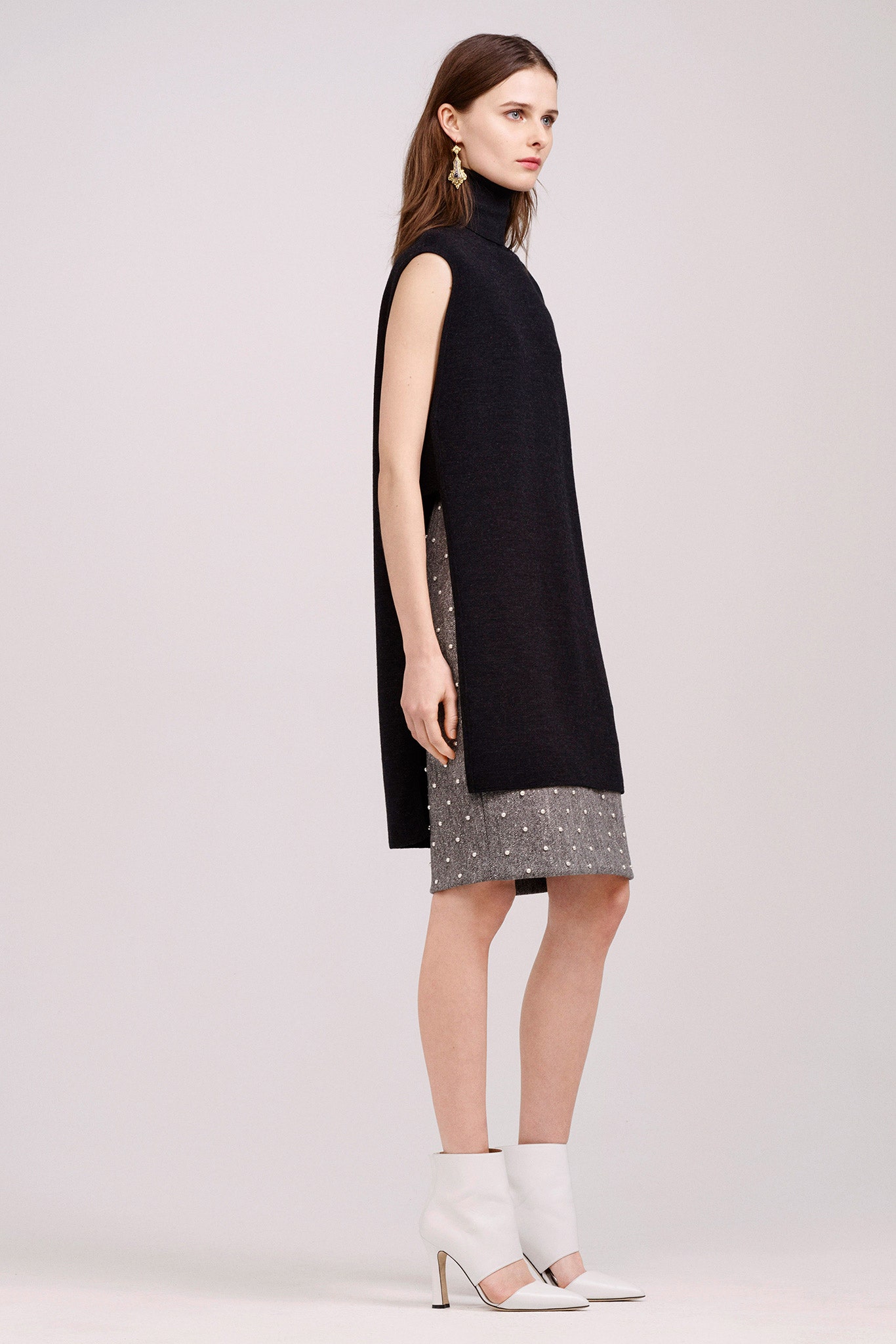 black cape and silver sequin dress