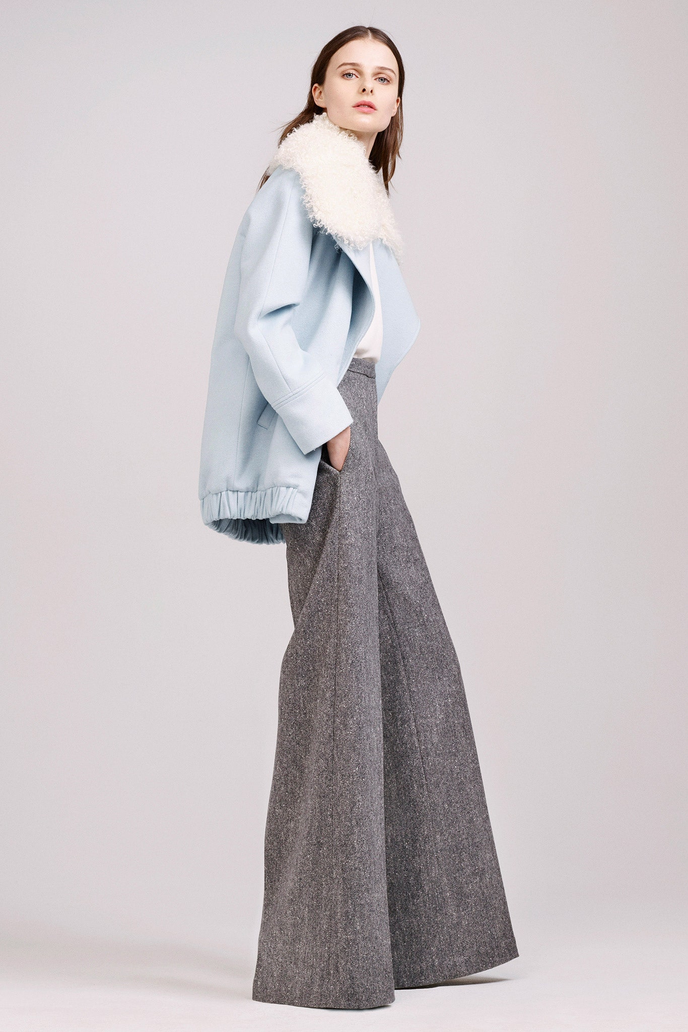 blue jacket and gray wide-leg pants