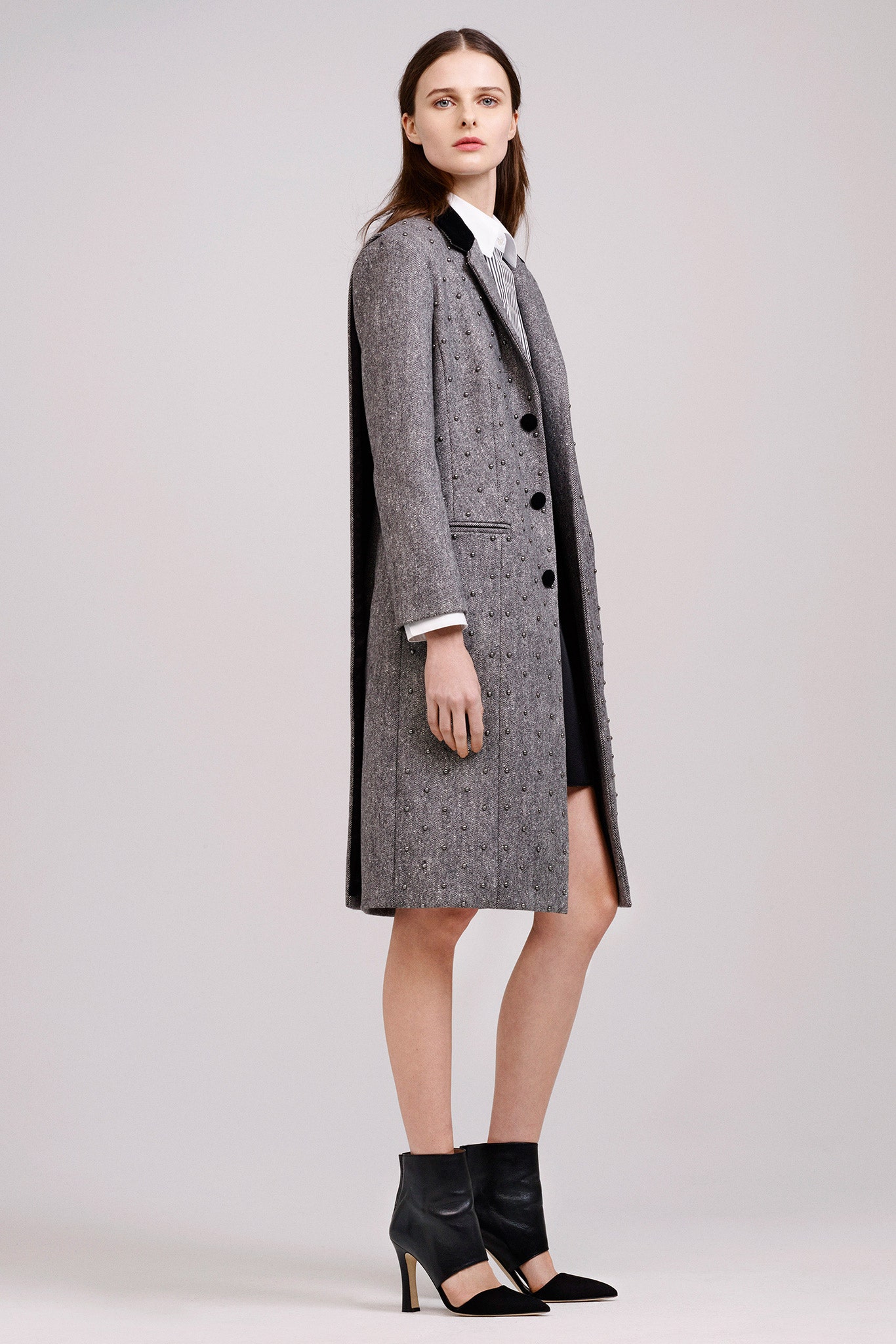 gray tailored coat with white shirt