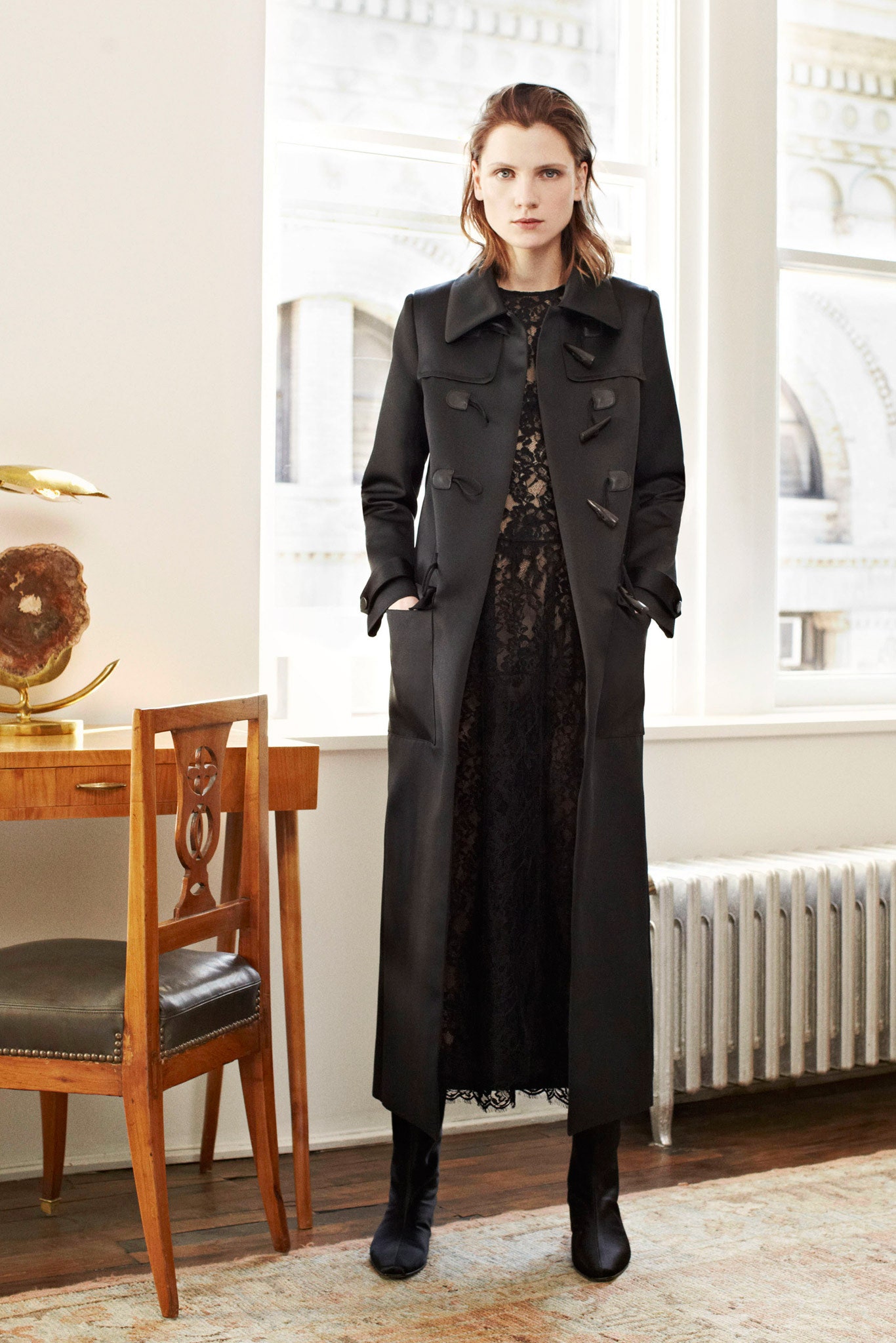 black wool long-sleeve collared fitted buttoned maxi coat