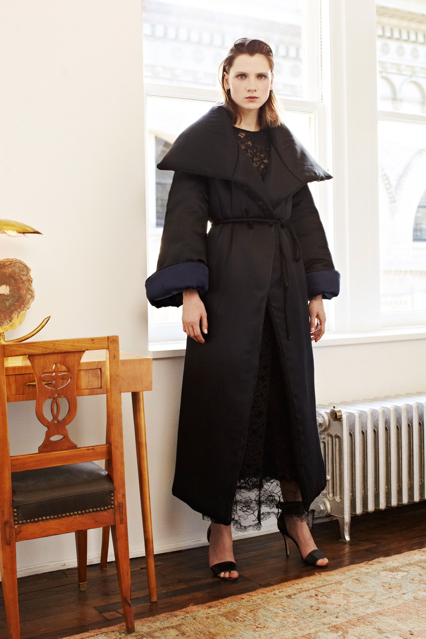 black wool coat and lace dress
