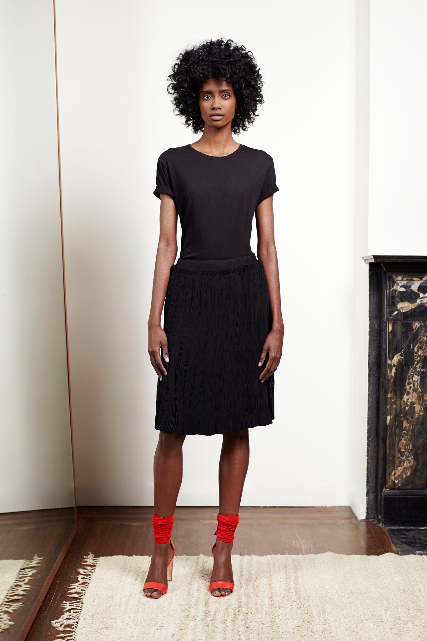 black silk fitted pleated midi skirt