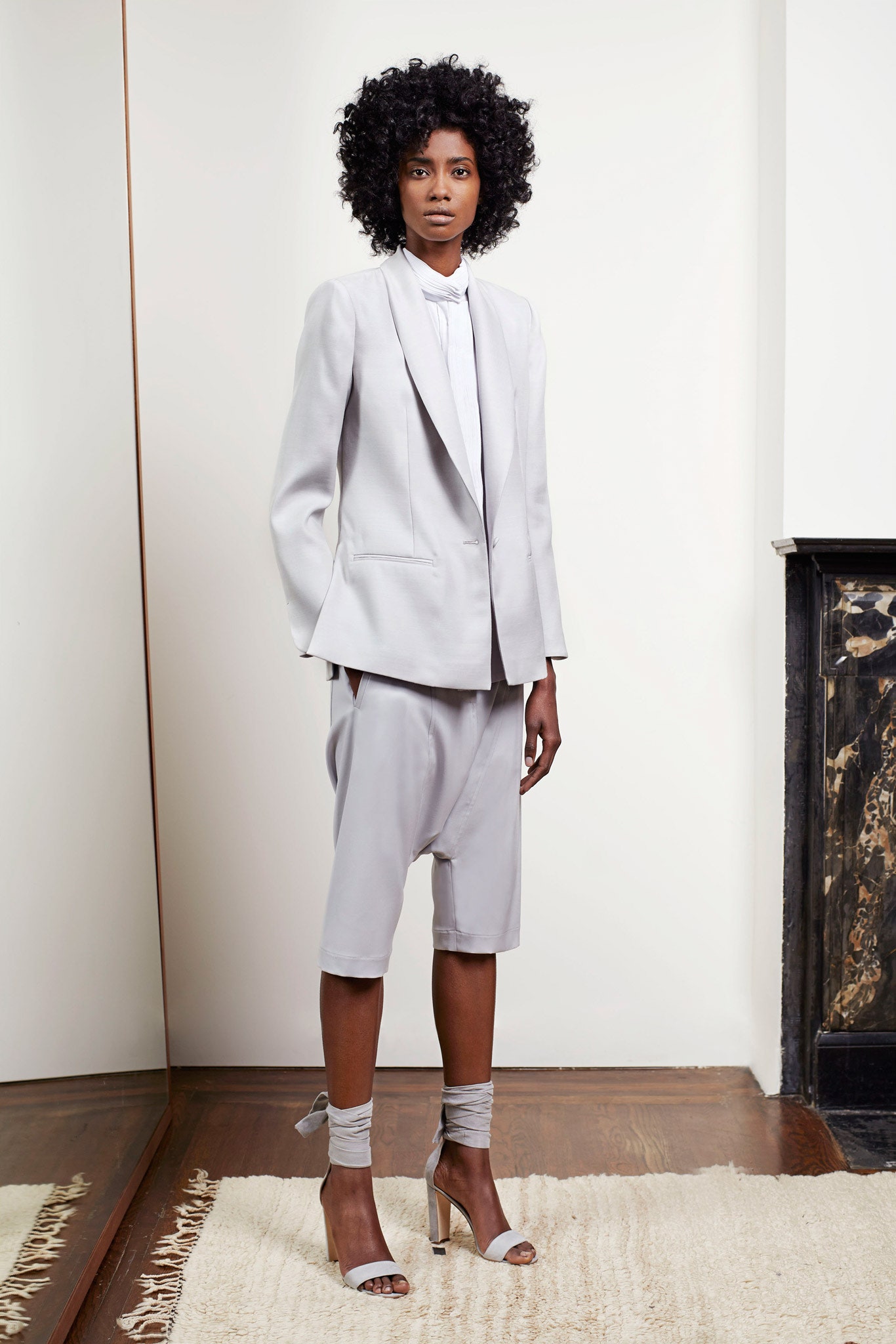 gray leather zippered shiny shoes