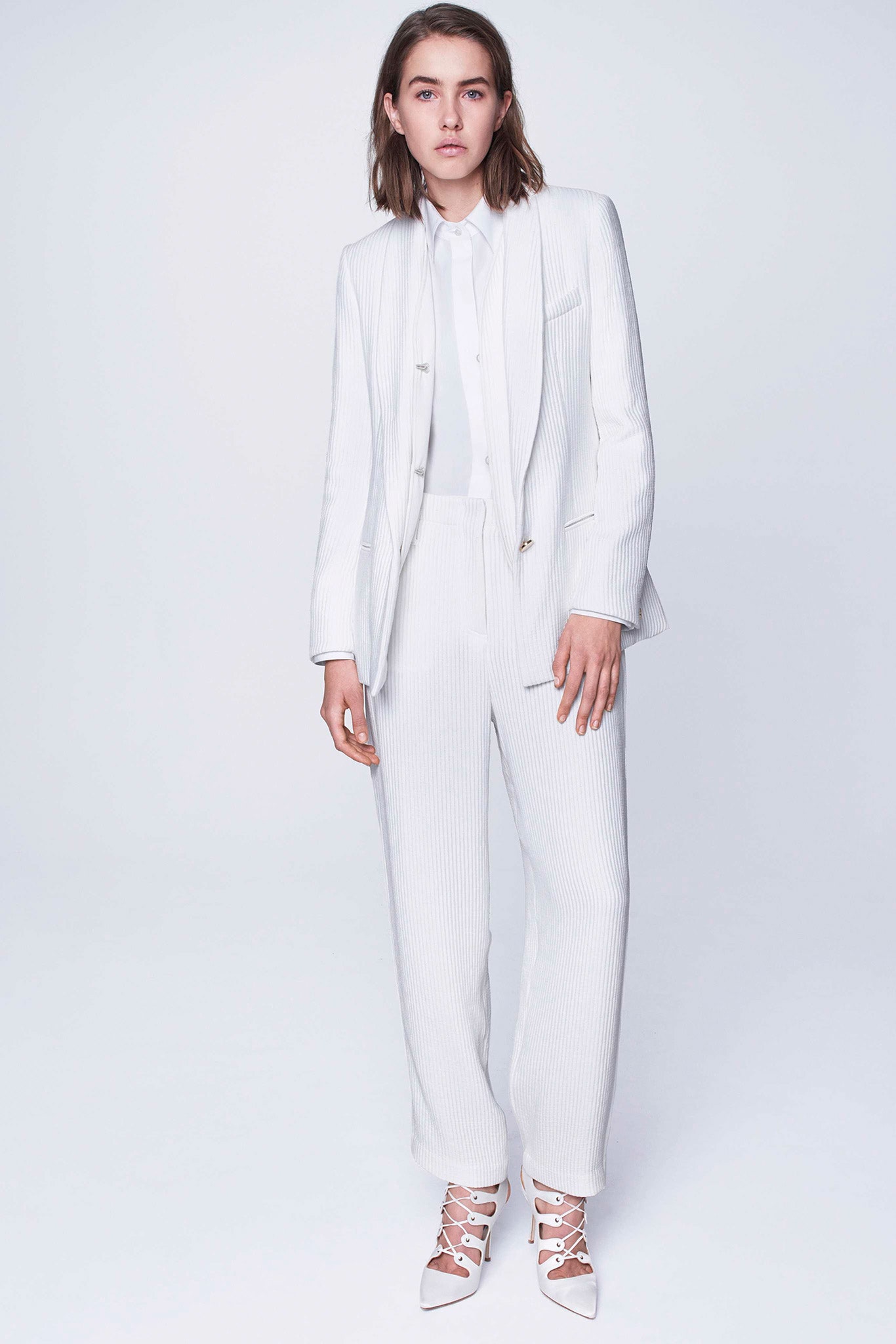 white tailored suit with shoes