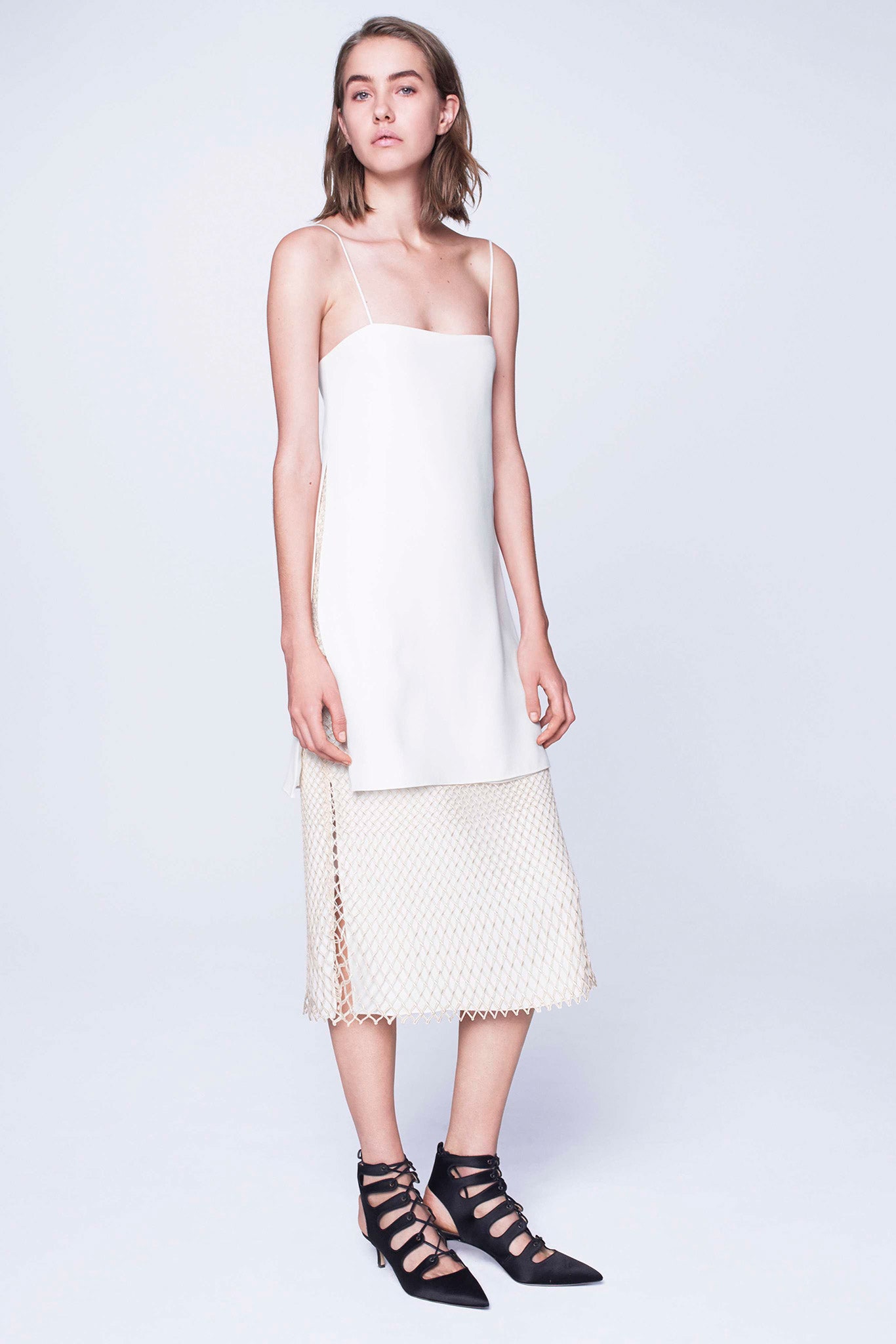 white silk midi dress with black shoes