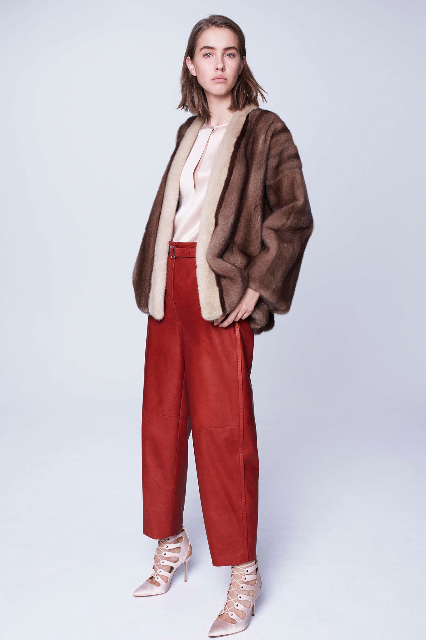 brown fur coat with pink top