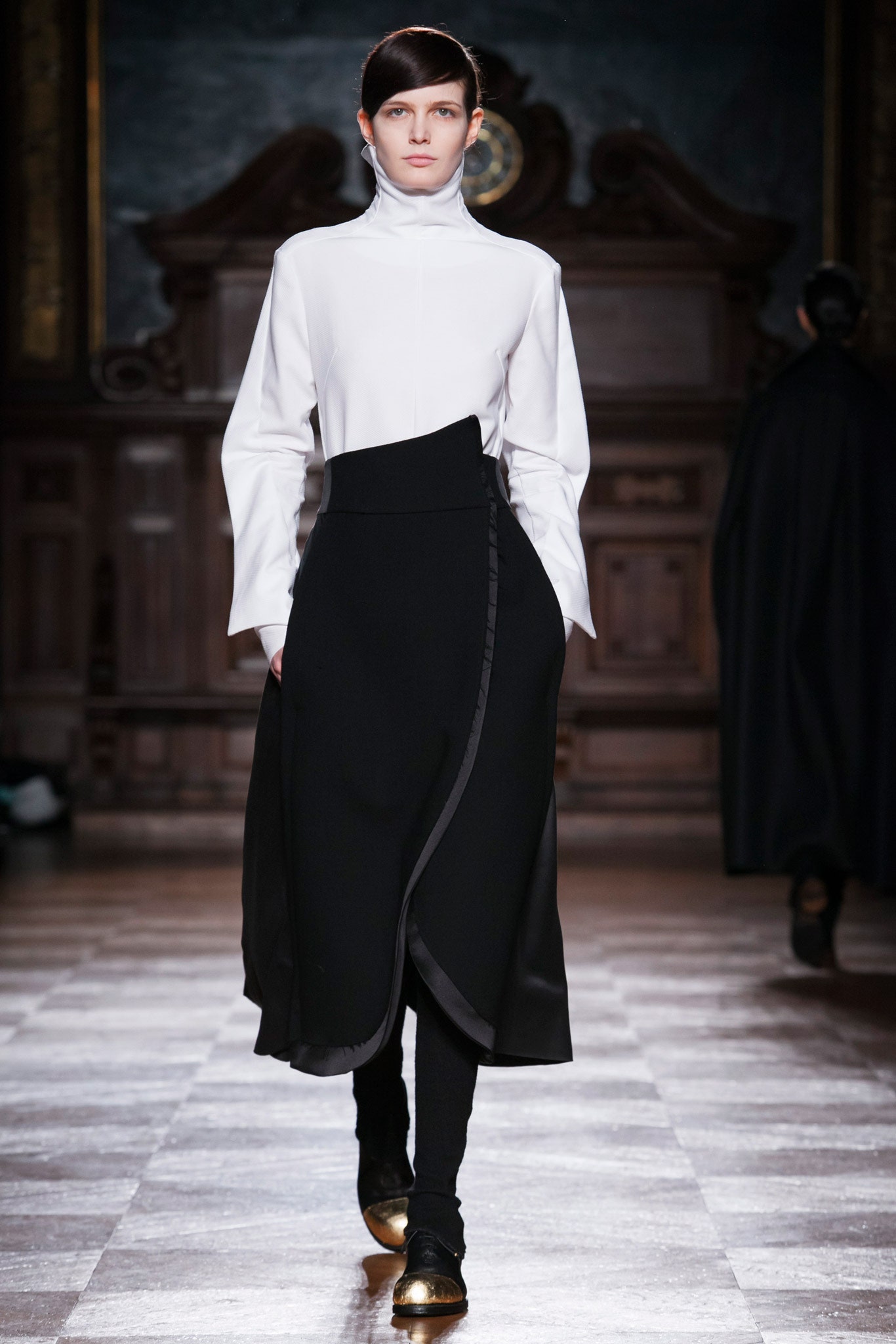 white fitted top with asymmetric black skirt