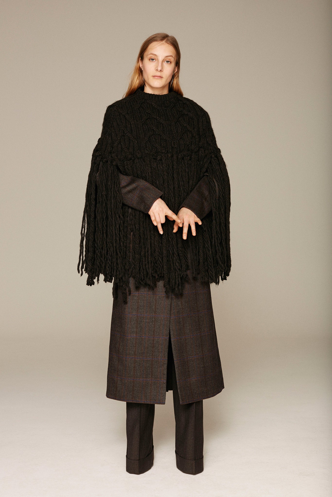 black wool long-sleeve collared fitted buttoned trench