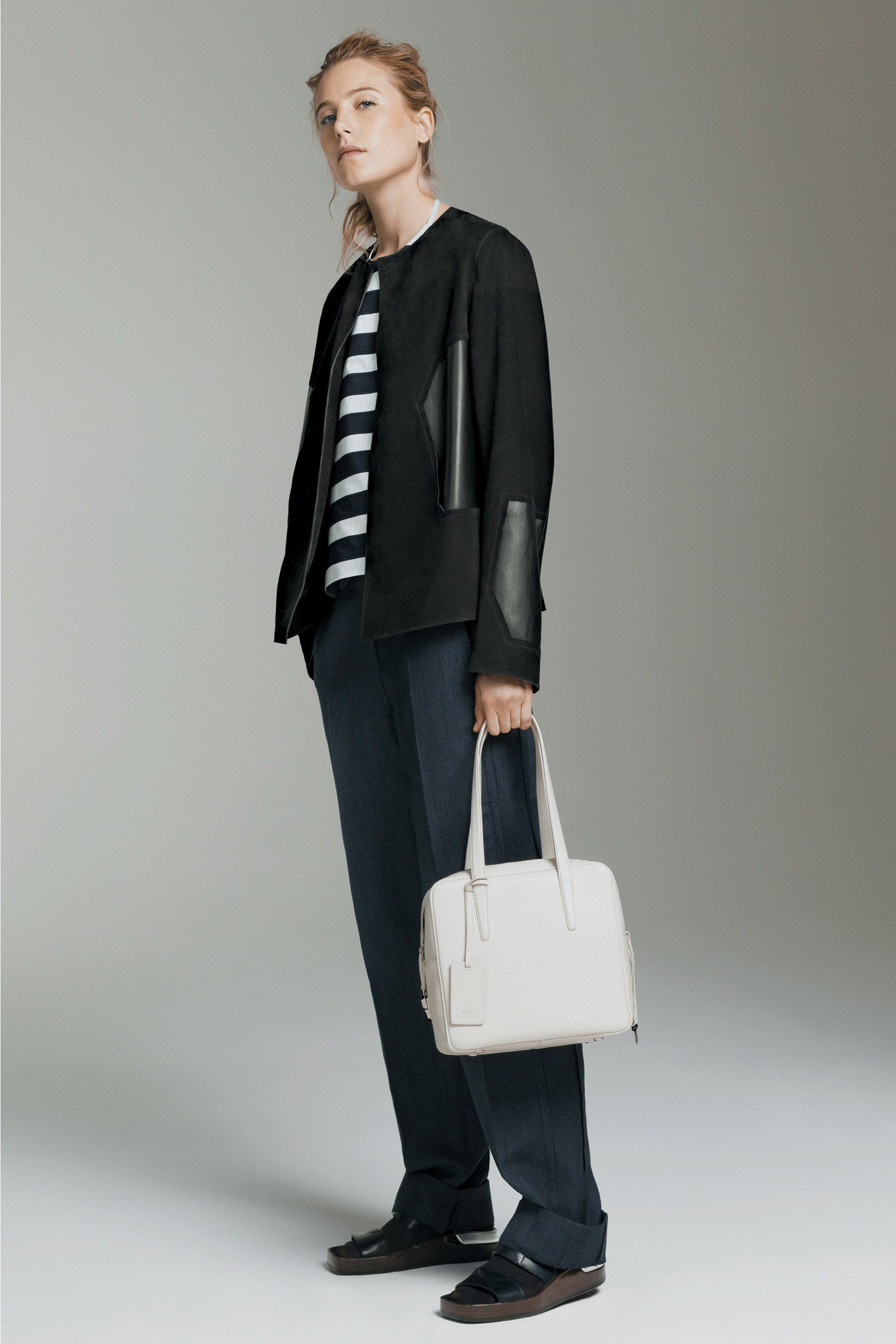 black jacket with striped shirt