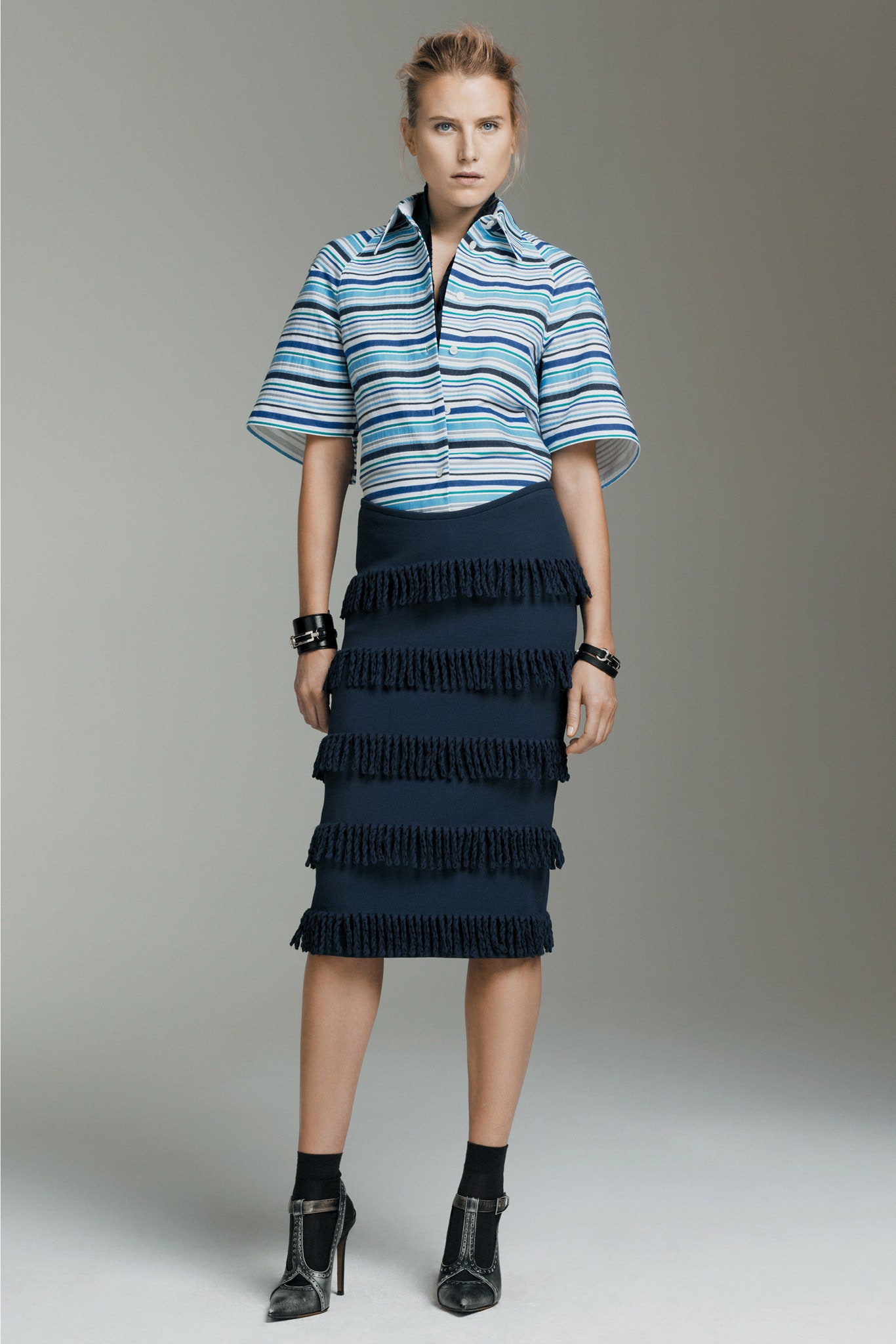 striped shirt and fringed skirt