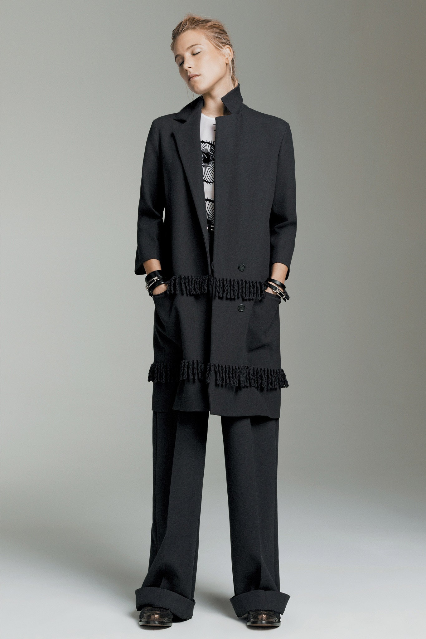 black wool coat with fringes