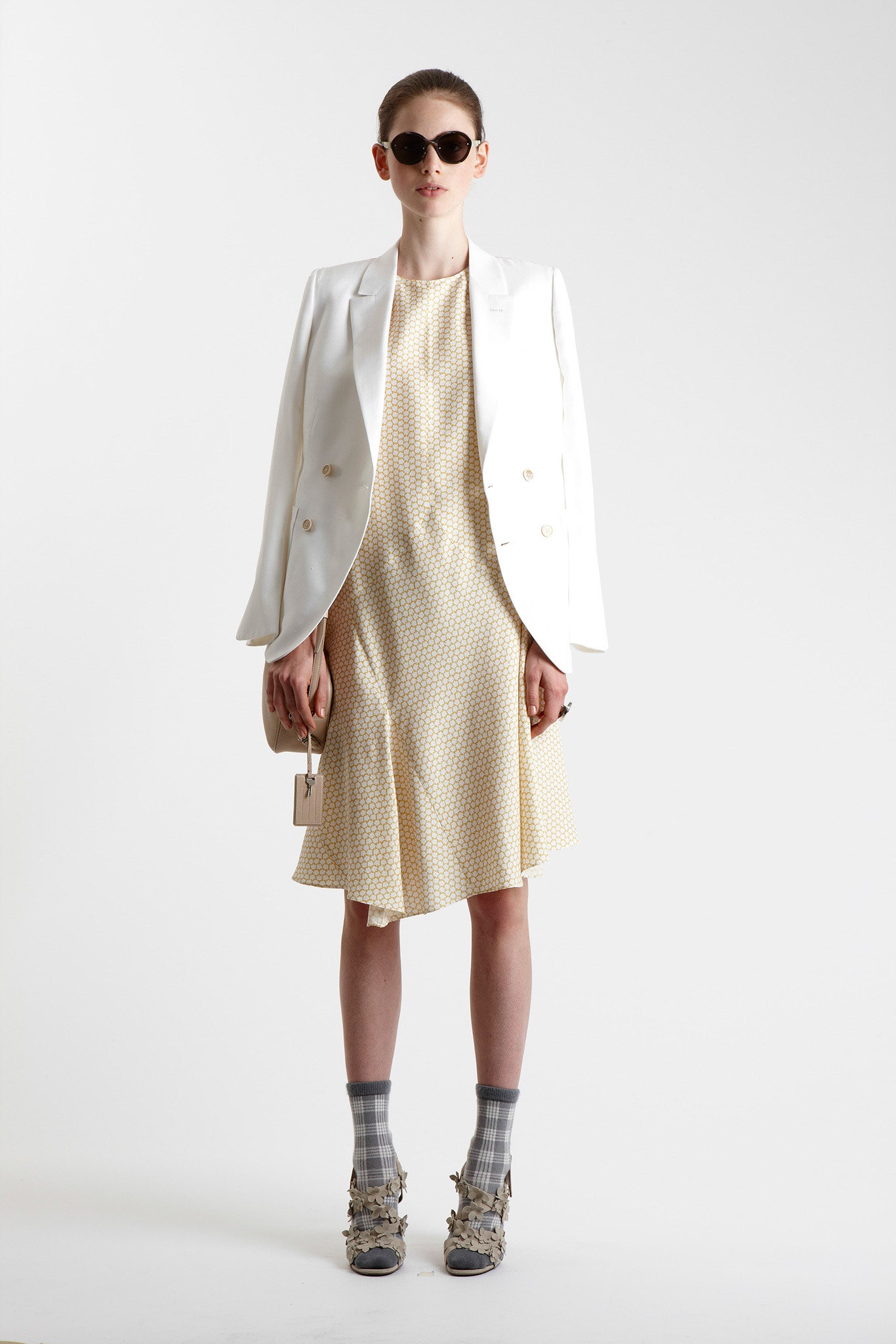 white tailored blazer with yellow dress