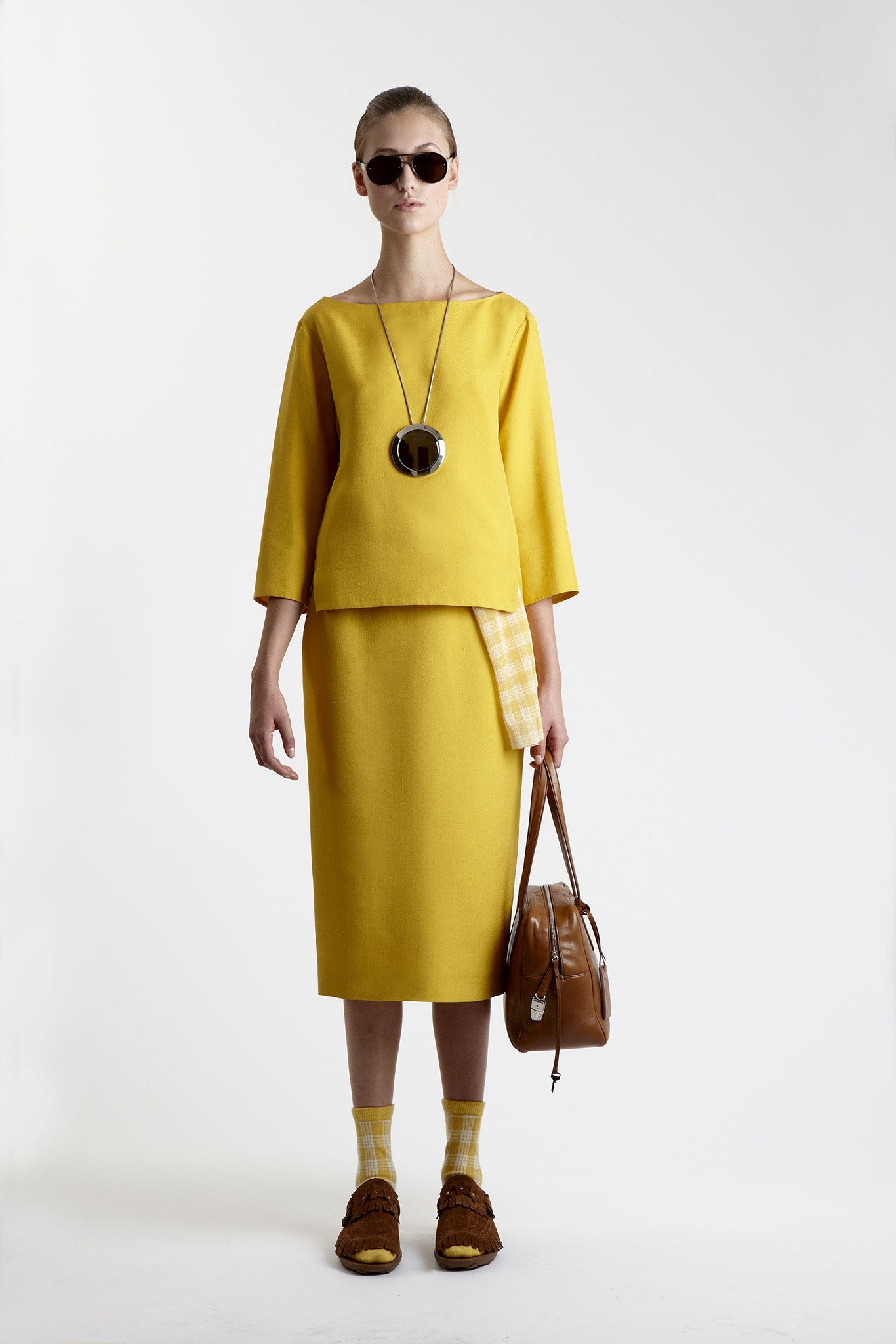 yellow fitted top and skirt