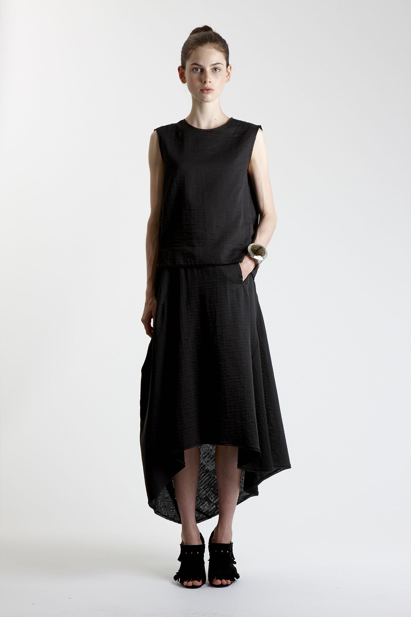 black relaxed top with asymmetric skirt