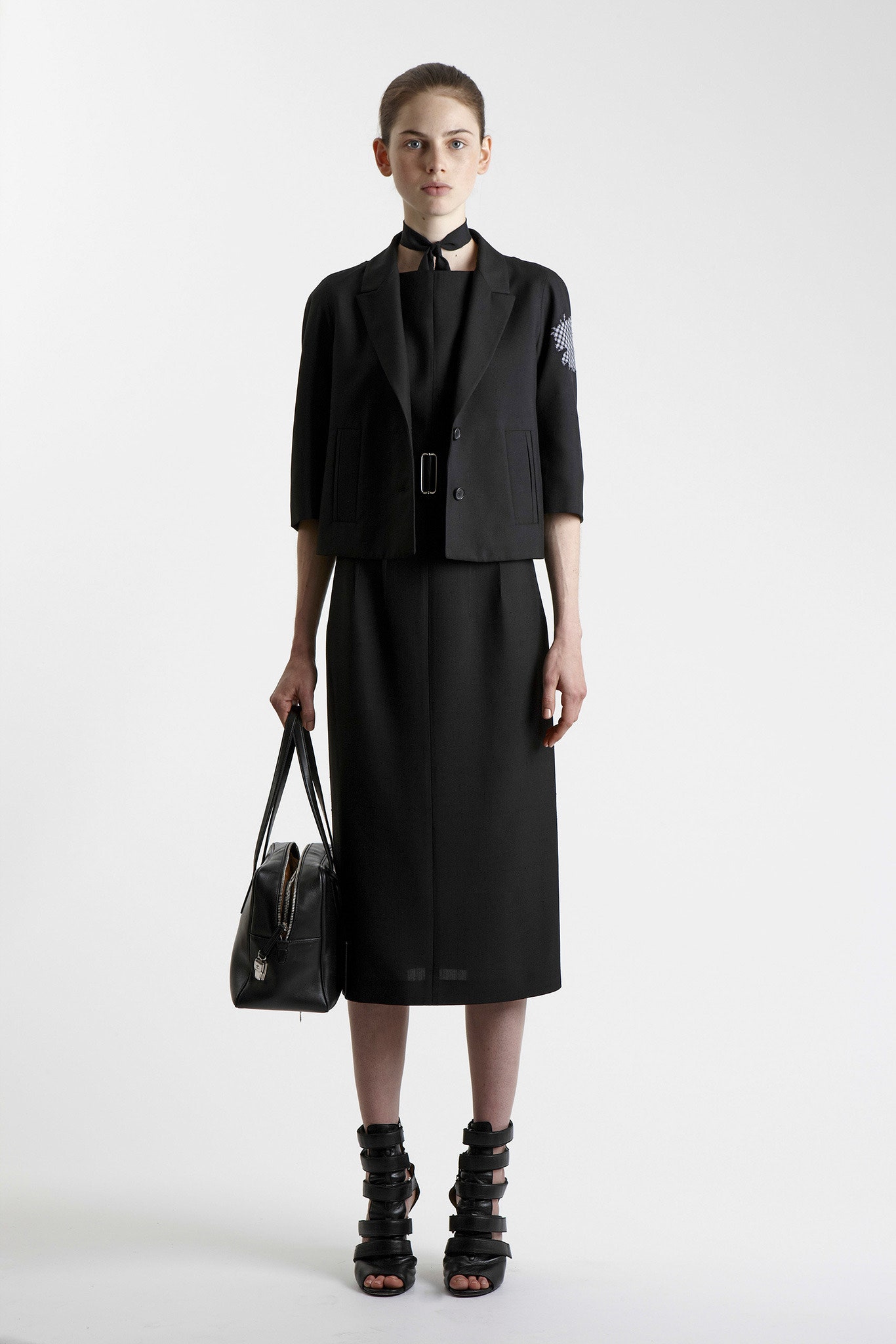 black tailored jacket and fitted dress
