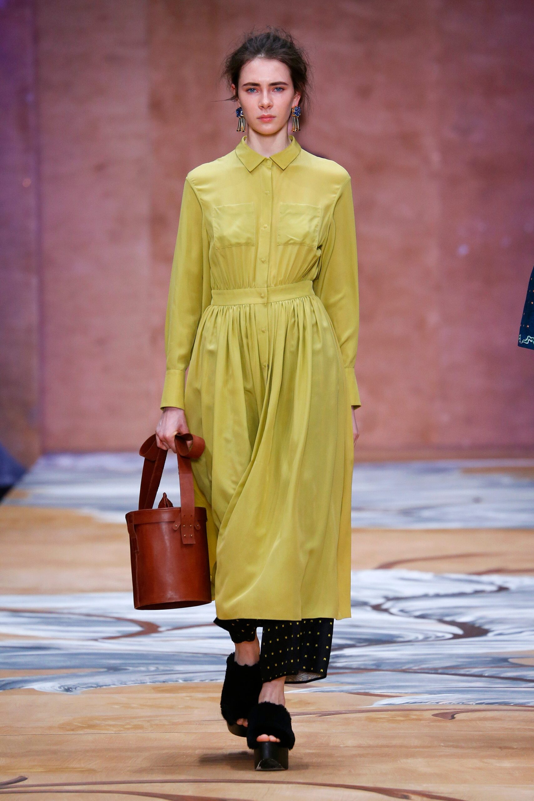 green silk midi dress with brown bag