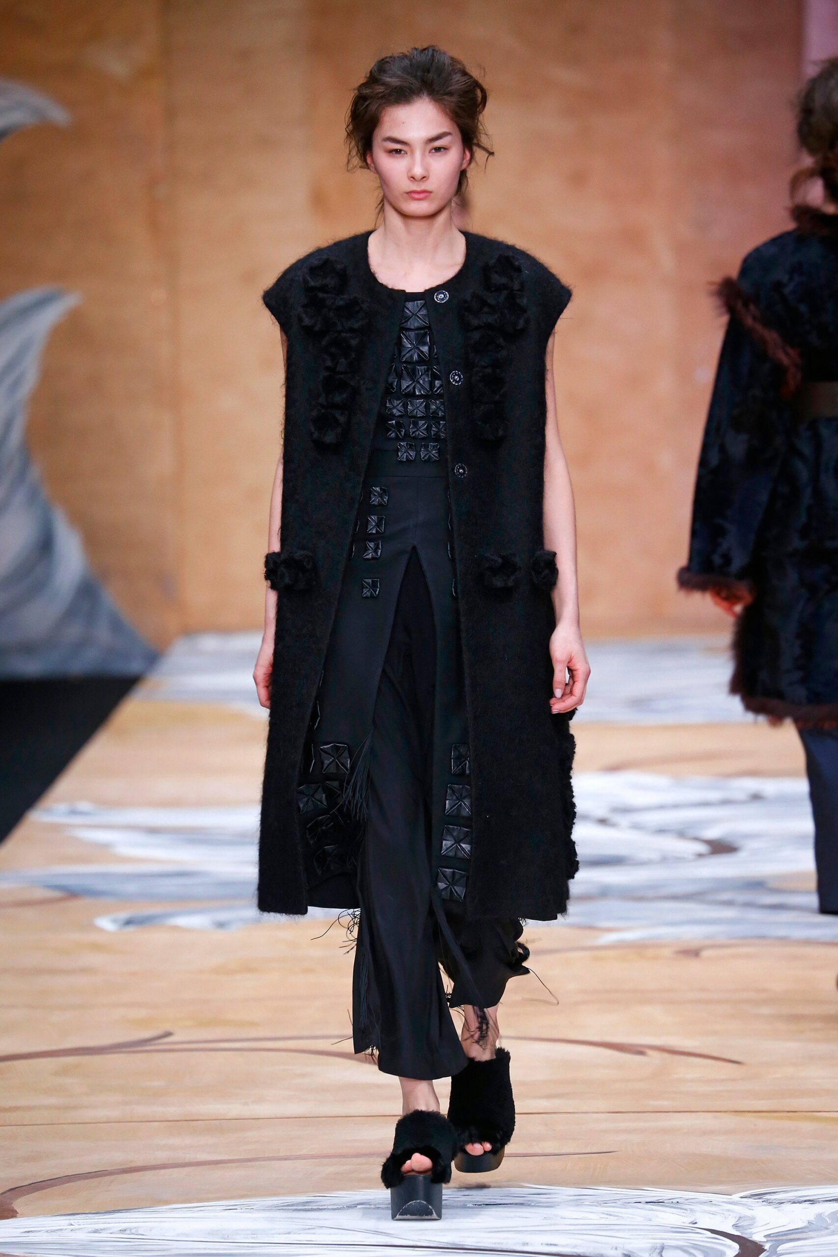 black wool coat with embellished top