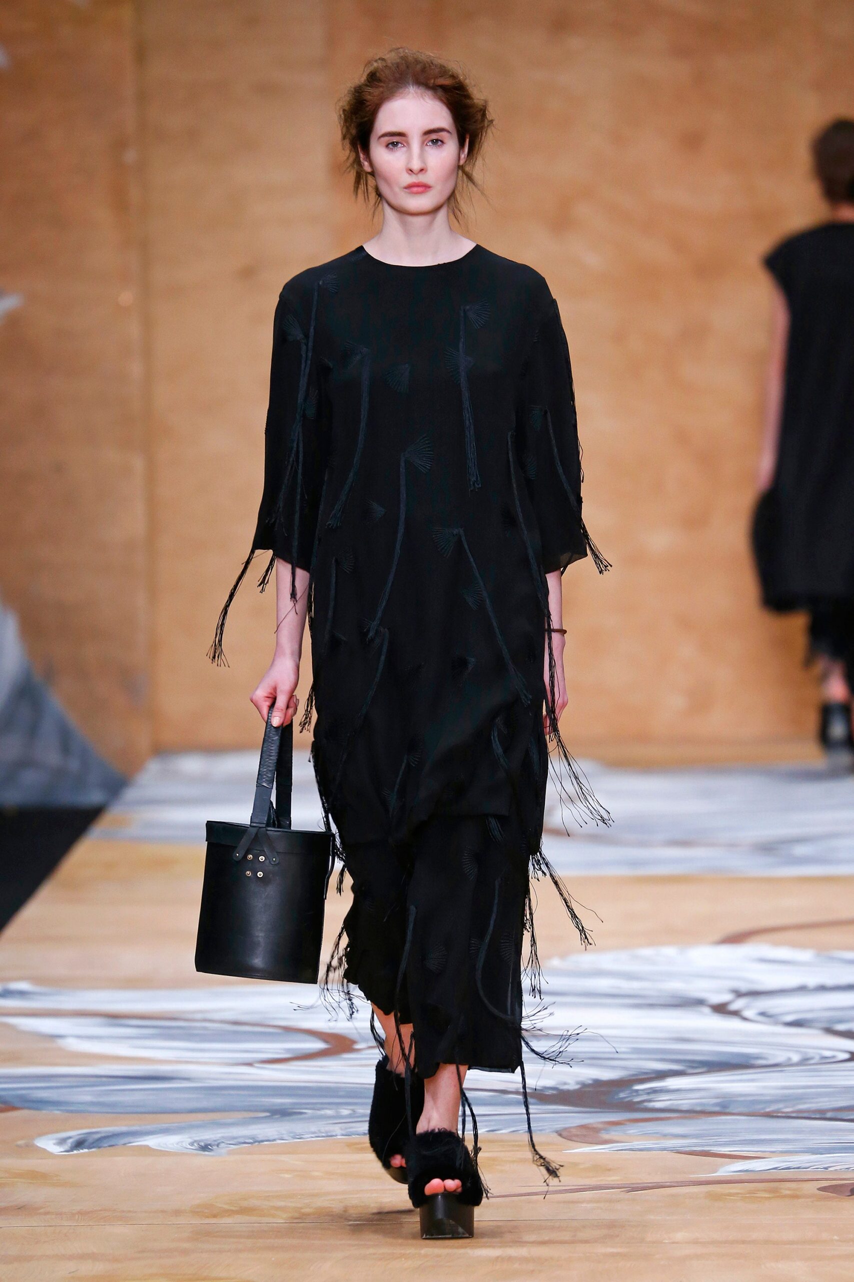 black relaxed midi dress with fringes