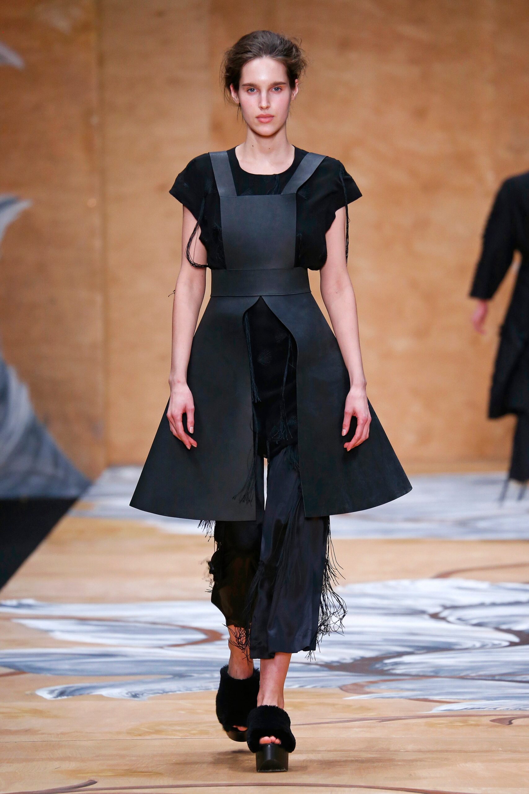 black layered midi dress with fringed pants