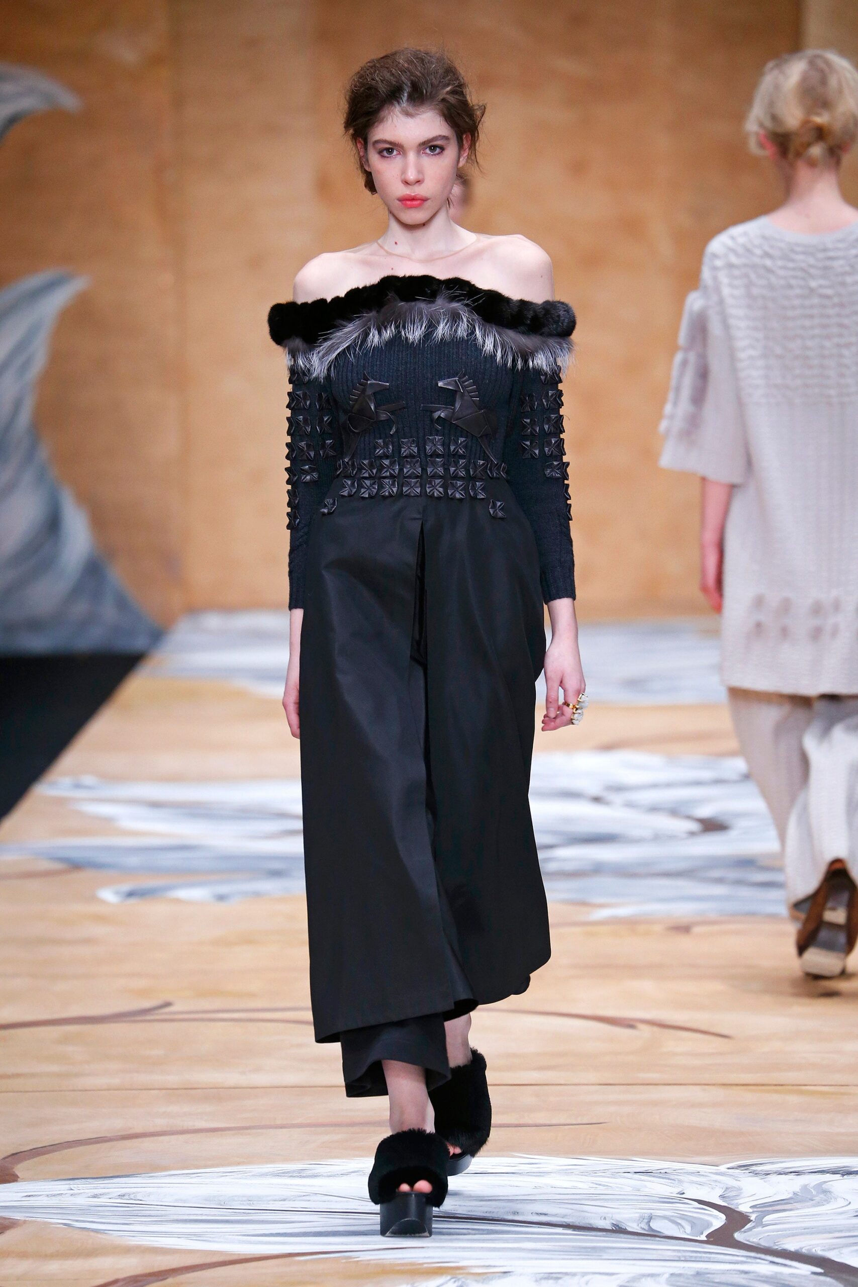 black off-shoulder top and wide-leg pants