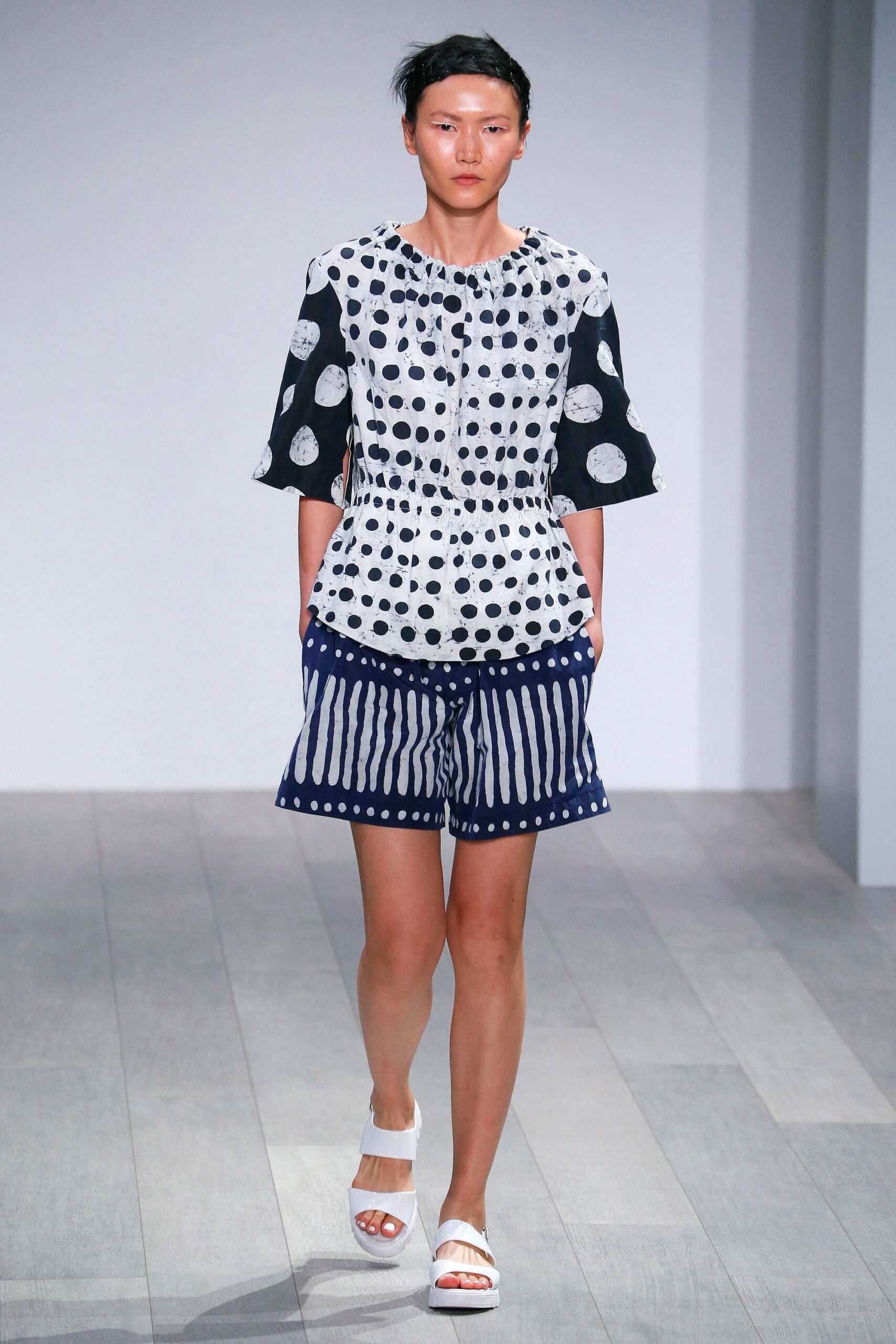 polka-dot top with striped shorts