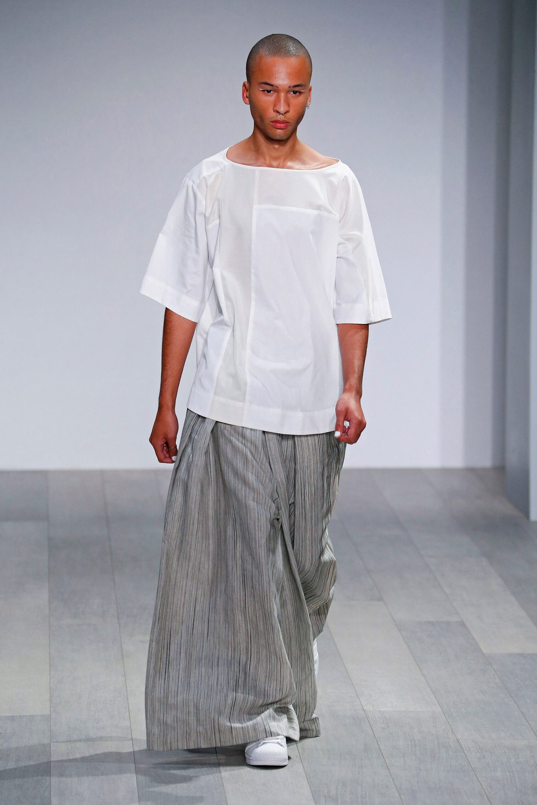 white relaxed top and gray pants