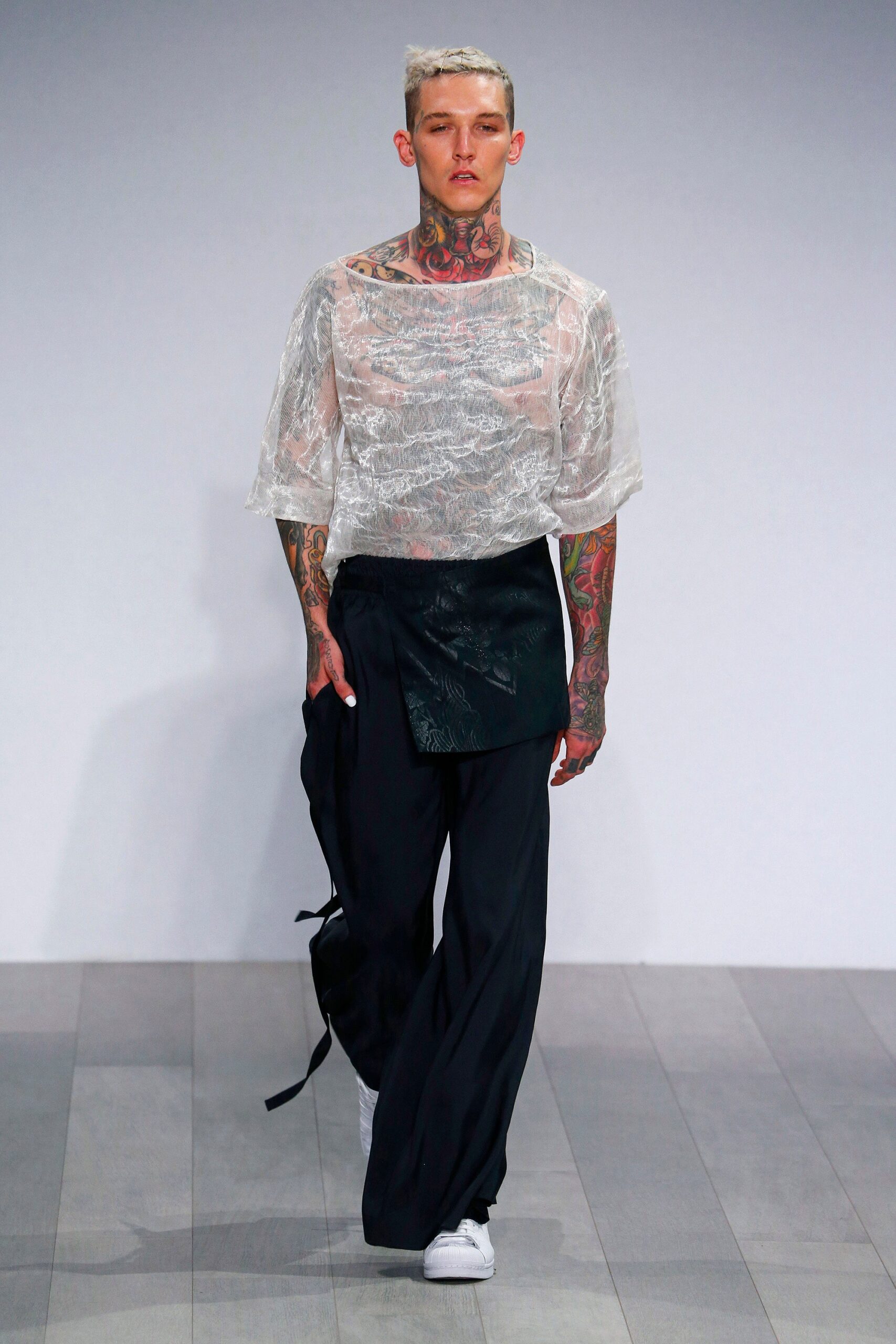 white sheer top and black pants