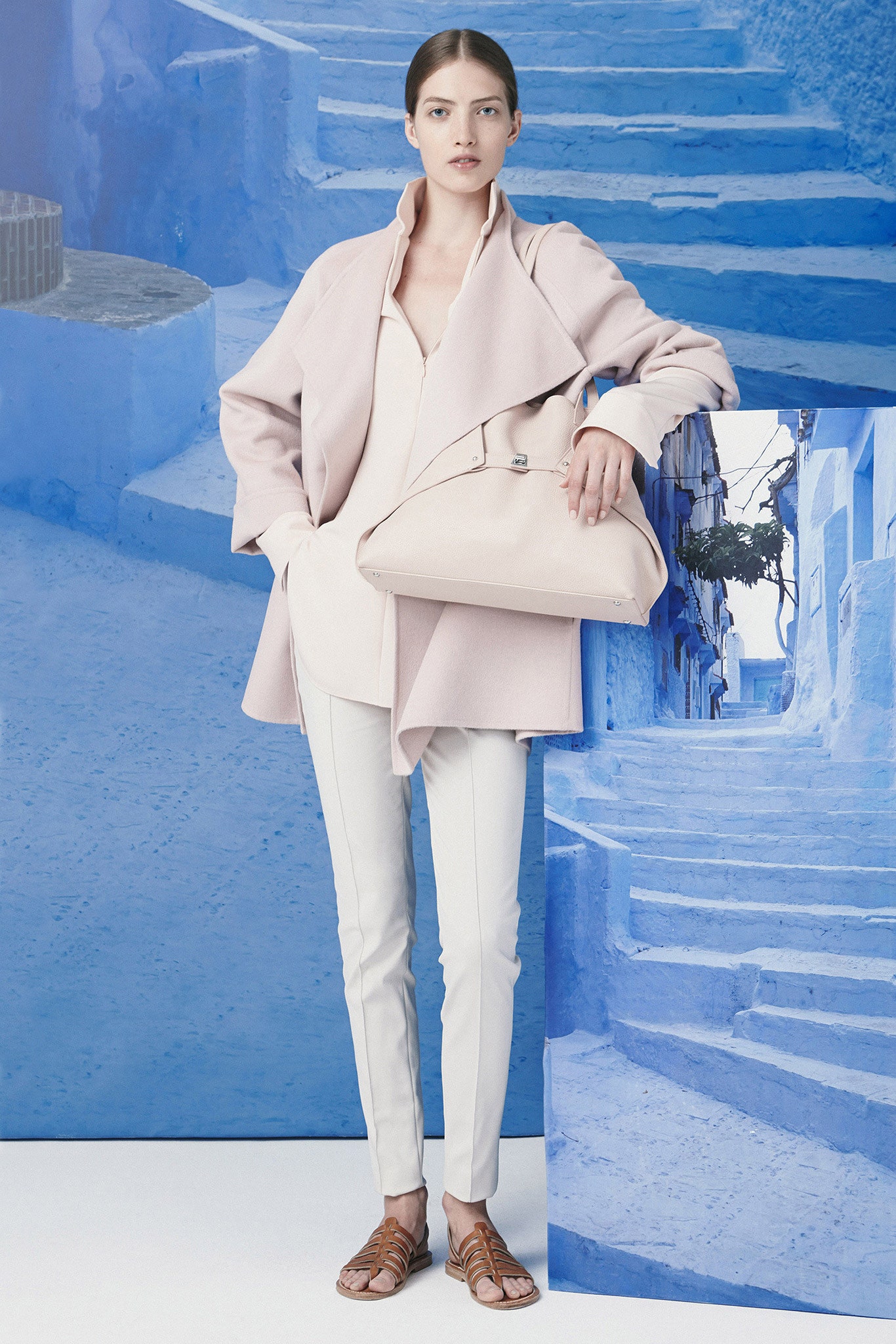 pink wool coat with beige pants