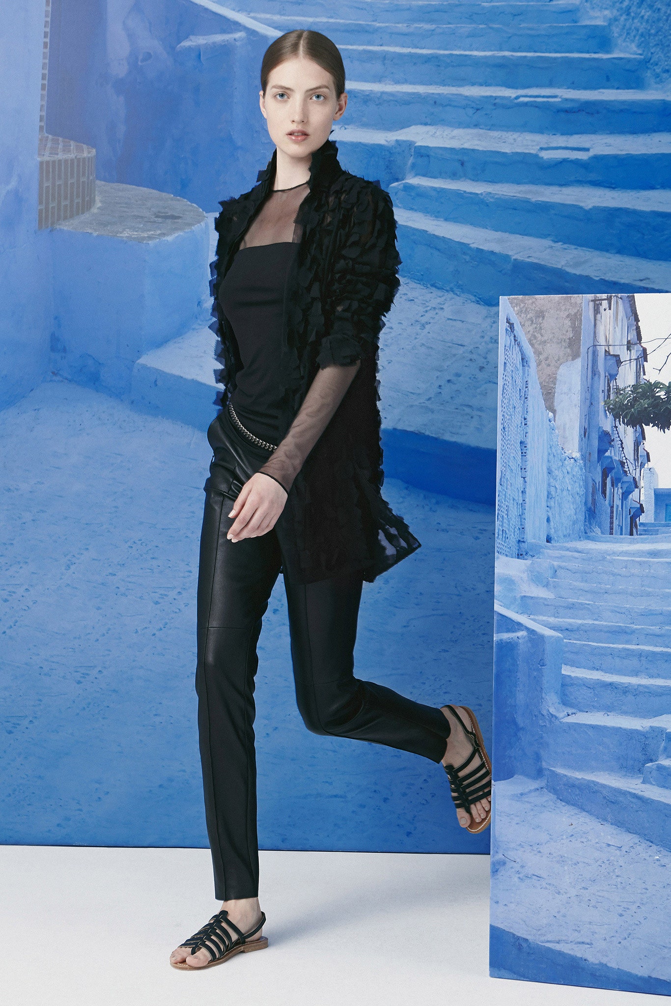 black fitted top with leather pants