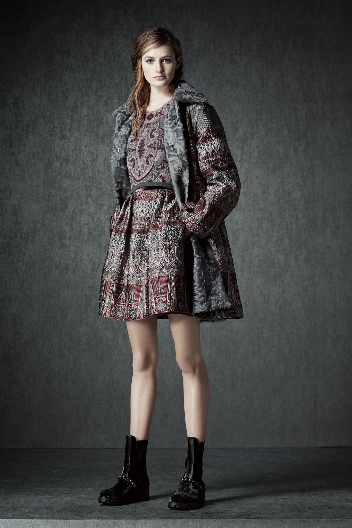 gray fur coat and red dress