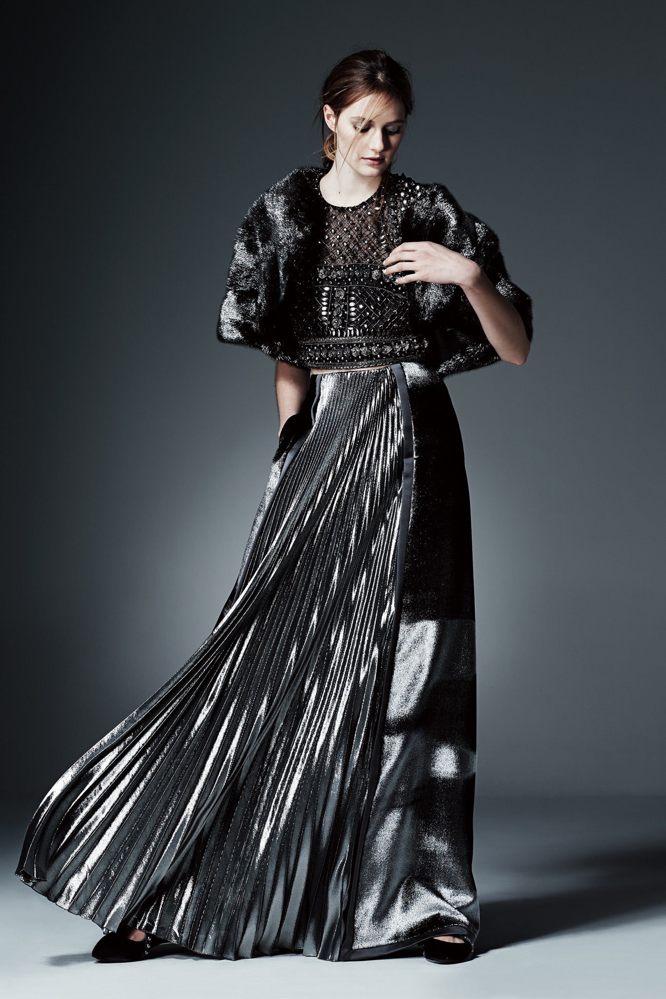black silk pleated gown with cape