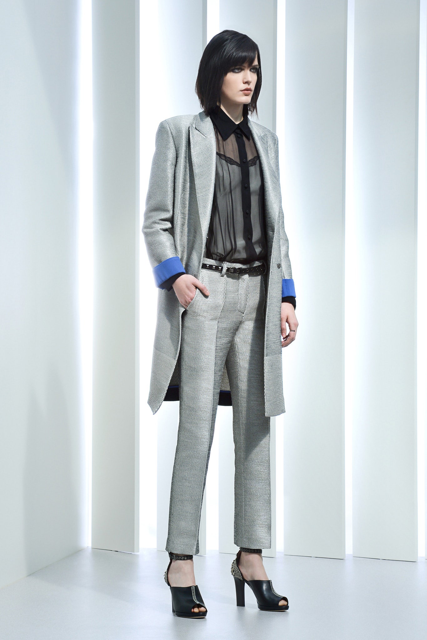 gray tailored coat with black blouse