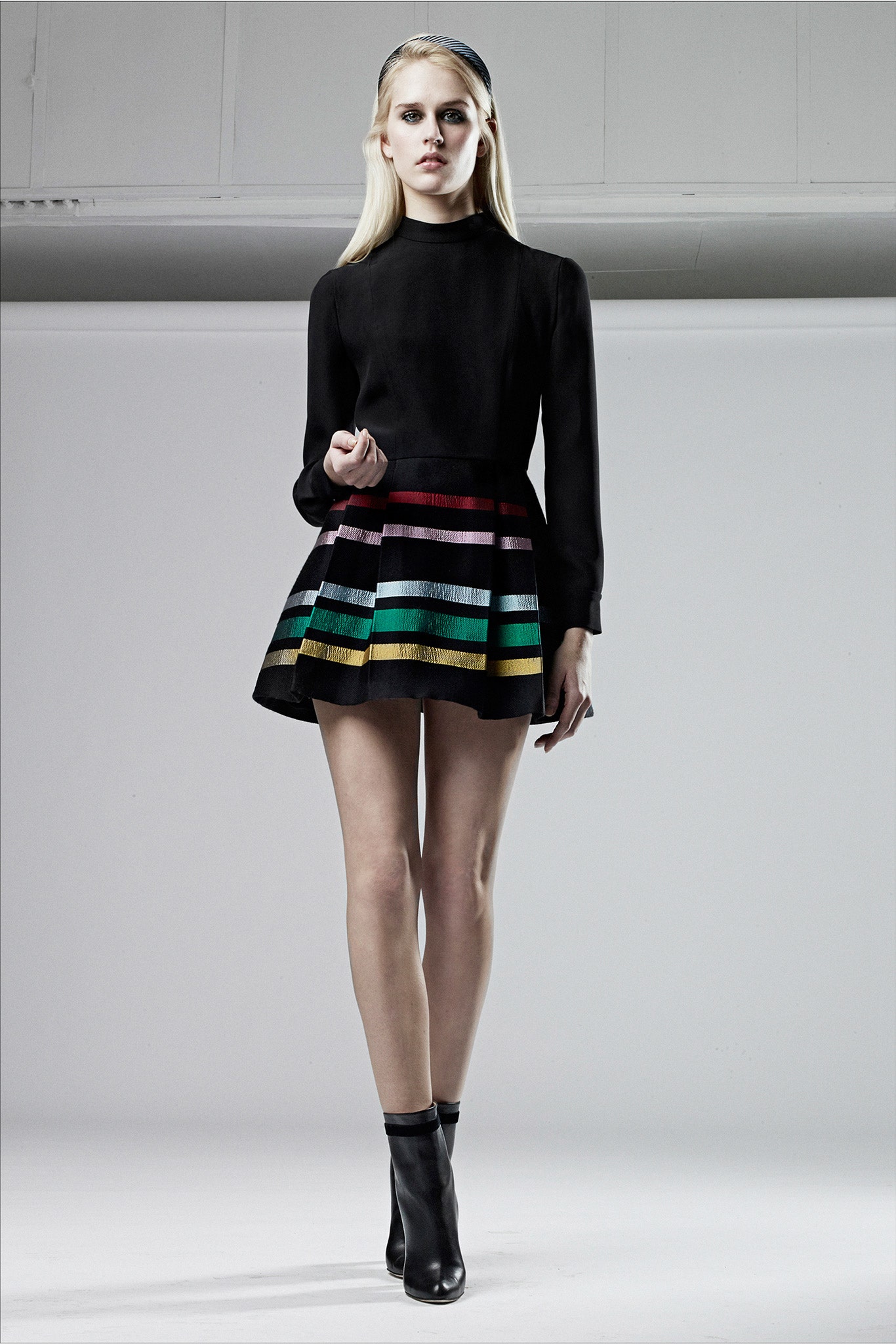 black mini dress with multi-colored pleats