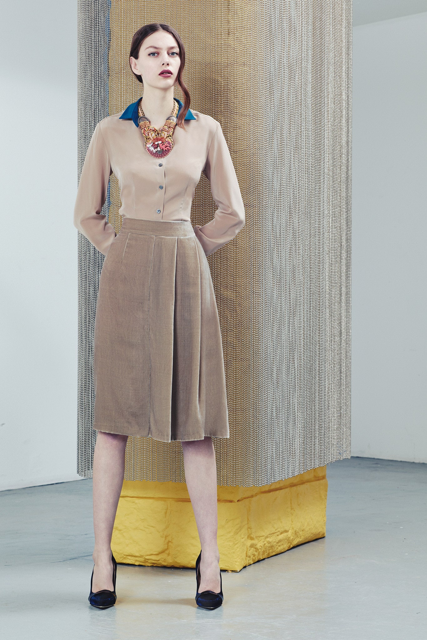beige silk long-sleeve collared fitted pleated blouse
