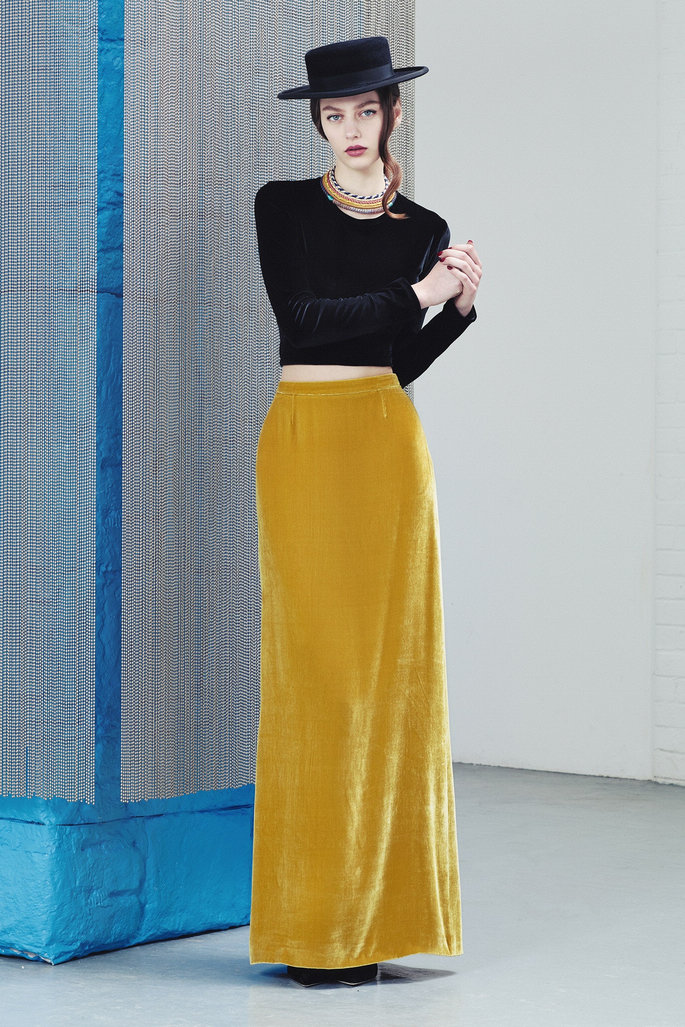 black velvet cropped top and yellow maxi skirt