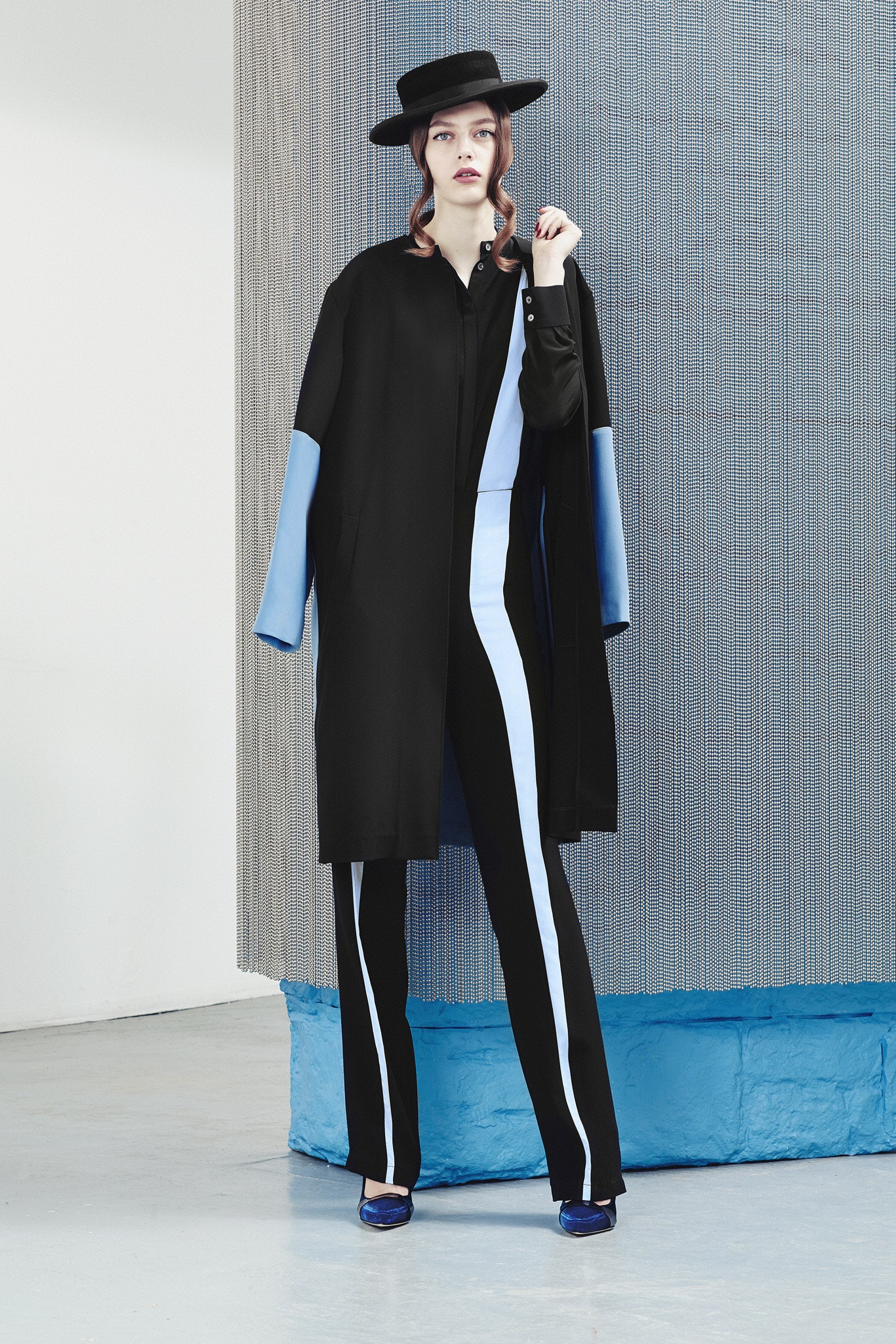 black and blue relaxed coat with fitted pants