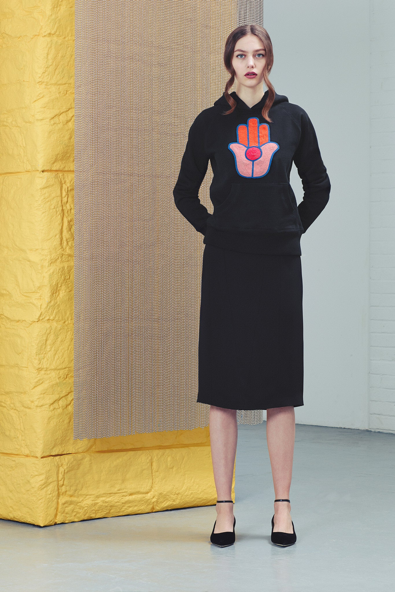 black hoodie and midi skirt