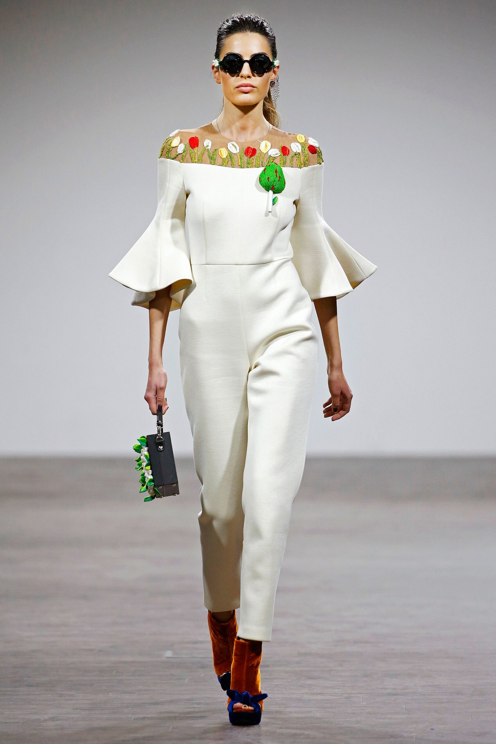 white fitted jumpsuit with embroidery