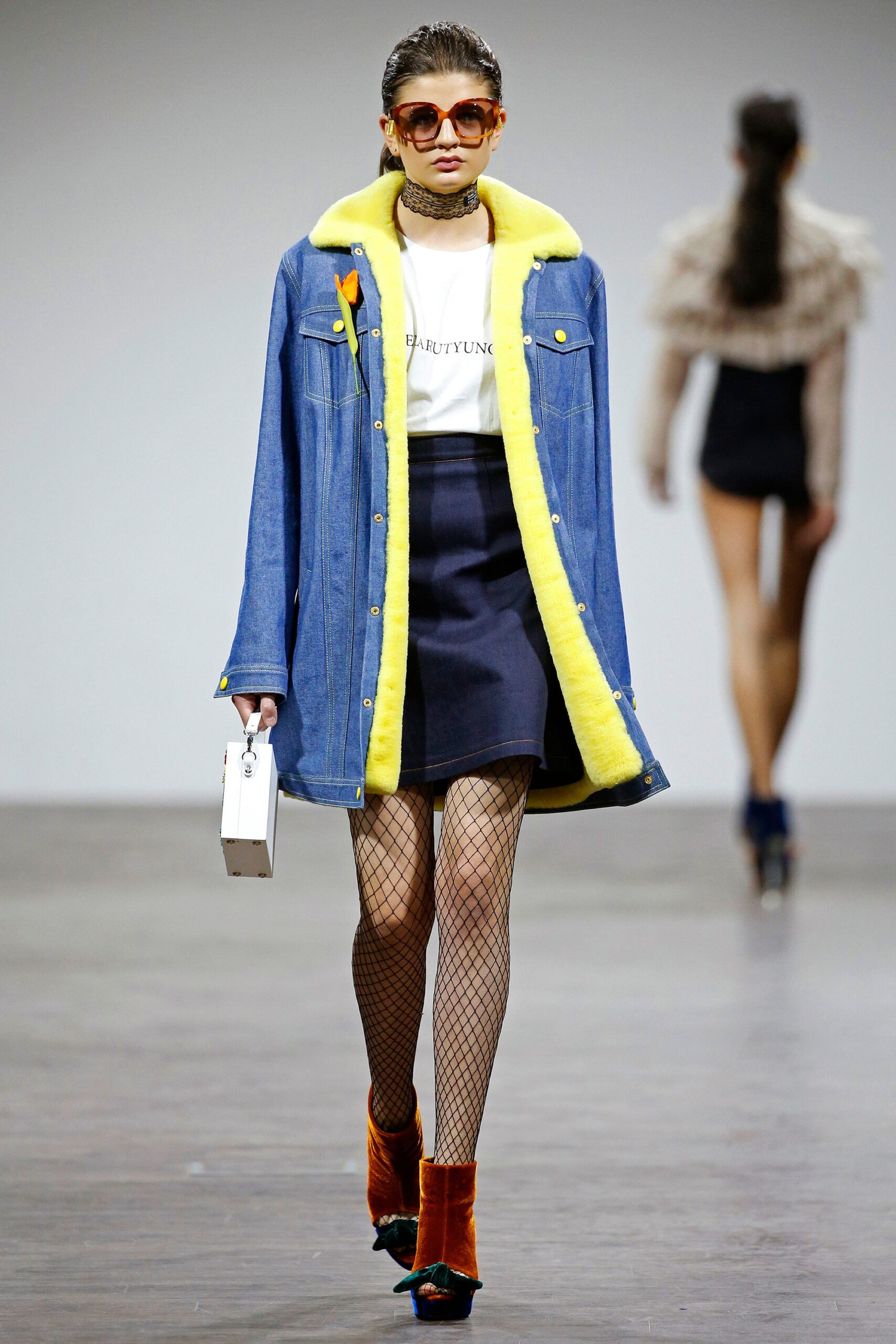 blue denim coat with yellow lining