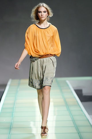 orange silk long-sleeve collared relaxed pleated flowing blouse